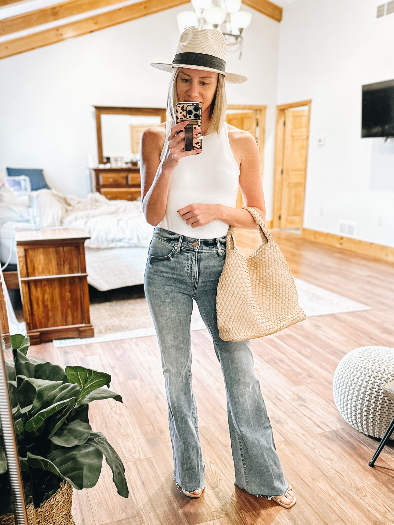 Feeling sassy for a date night. 40% off these flare jeans. 

Fashionably late mom
White bodysuit
Neutral bag
Summer fedora
Braided sandals
Express
Amazon fashion
Summer outfit 


#LTKsalealert #LTKstyletip #LTKunder100