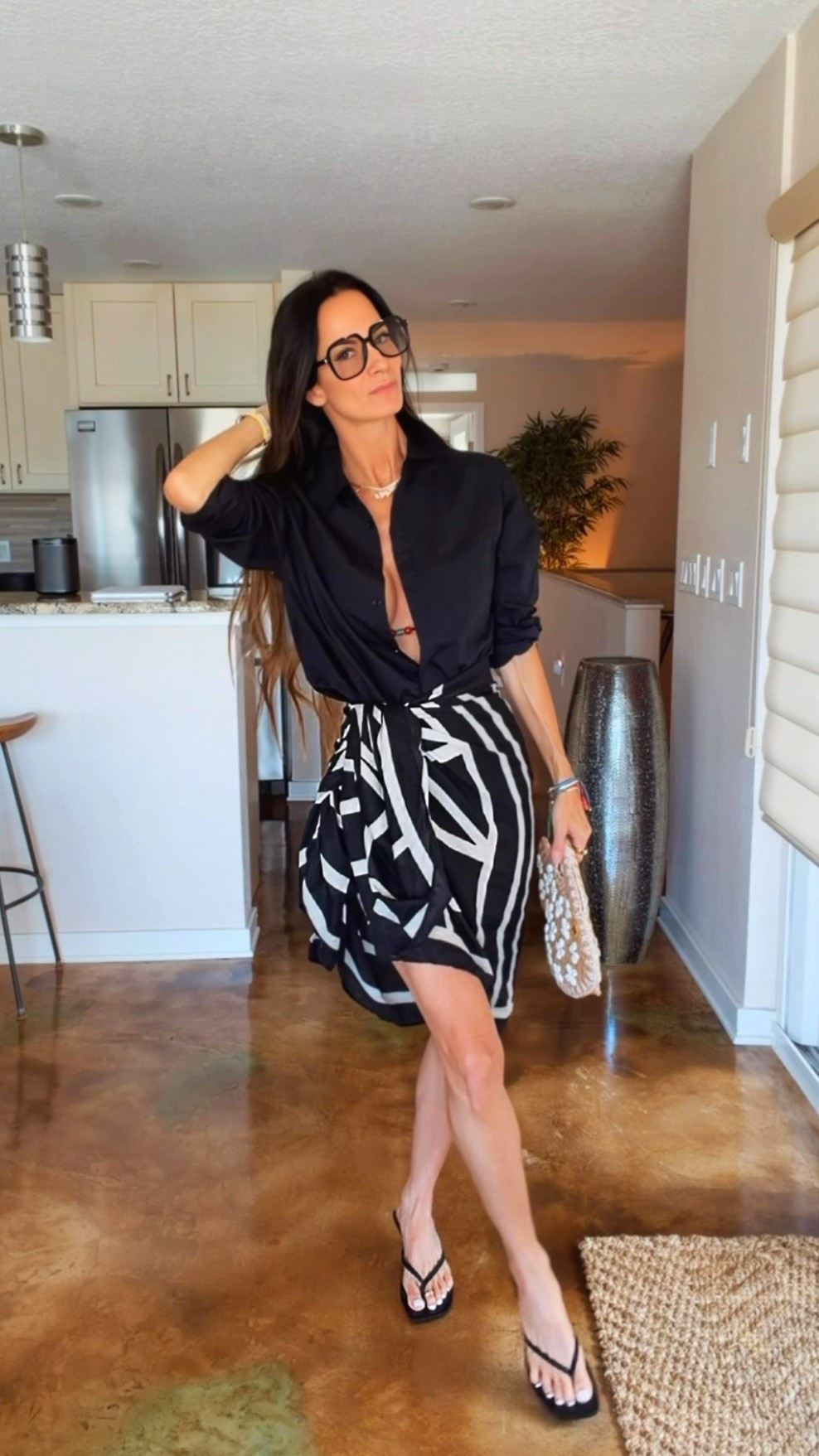One shirt. Three completely different personalities. 🤍✨

The kind of piece that quietly becomes the hardest-working item in your closet.

☀️ Throw it over a bikini for the beach.
🥂 Tie it over a sarong for brunch.
💼 Tuck it into tailored pants and suddenly you’re ready for the boardroom.

Proof that you don’t need more clothes… you just need pieces that work harder.

Which look are you choosing first: Beach, Brunch, or Boardroom? Tell me below! 👇

#NicoleColeeStyle #CapsuleWardrobe #StyleOver40 #SummerStyle #OOTD

#LTKdayinmylife #LTKgrwm #LTKootd
