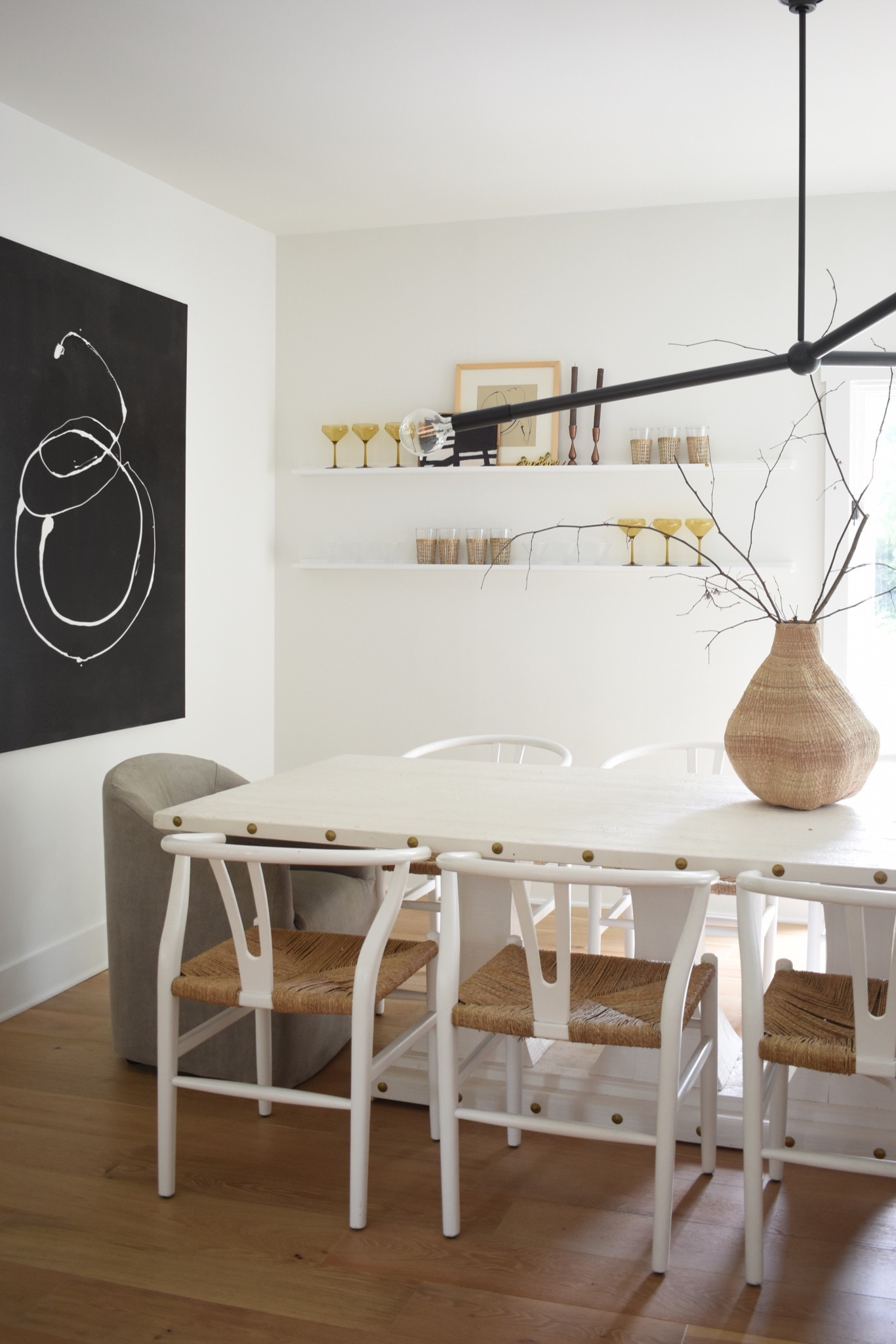 One of my very favorite corners of the house 🤍 we eat almost every meal, especially dinners right in this corner. I had debated adding these thin floating shelves but the second we did I knew it was the right call. 

I envision swapping out decor for different occasions or holidays. It creates an unexpected way to display small art pieces, or add a pop of color. Plus, the extra storage for a few of my favorite glasses is a mega bonus!

#LTKhome #LTKstyletip #LTKfindsunder50