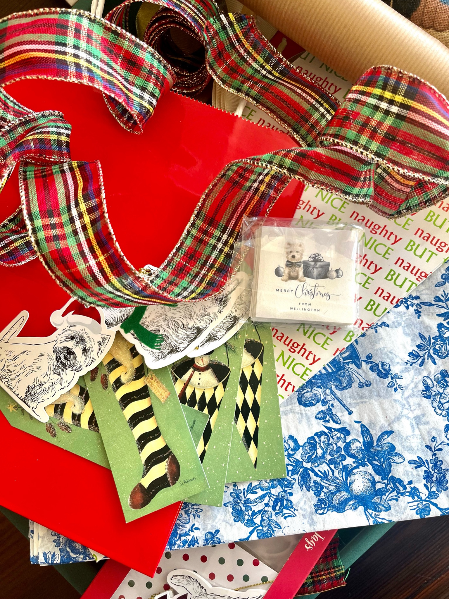 Confession - I love wrapping paper and ribbon. I always want to buy it and then I like to hoard it. This year, I made myself use what I have! Nothing new.. 
I love paper that can work across seasons and holidays- like red gift bags and blue and white toile tissue paper that mixes and matches with something holiday specific. Stock up!

#LTKSeasonal #LTKstyletip #LTKGiftGuide