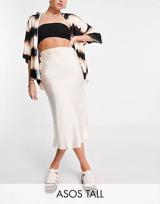 ASOS DESIGN Tall satin bias slip midi skirt in off white | ASOS (Global)