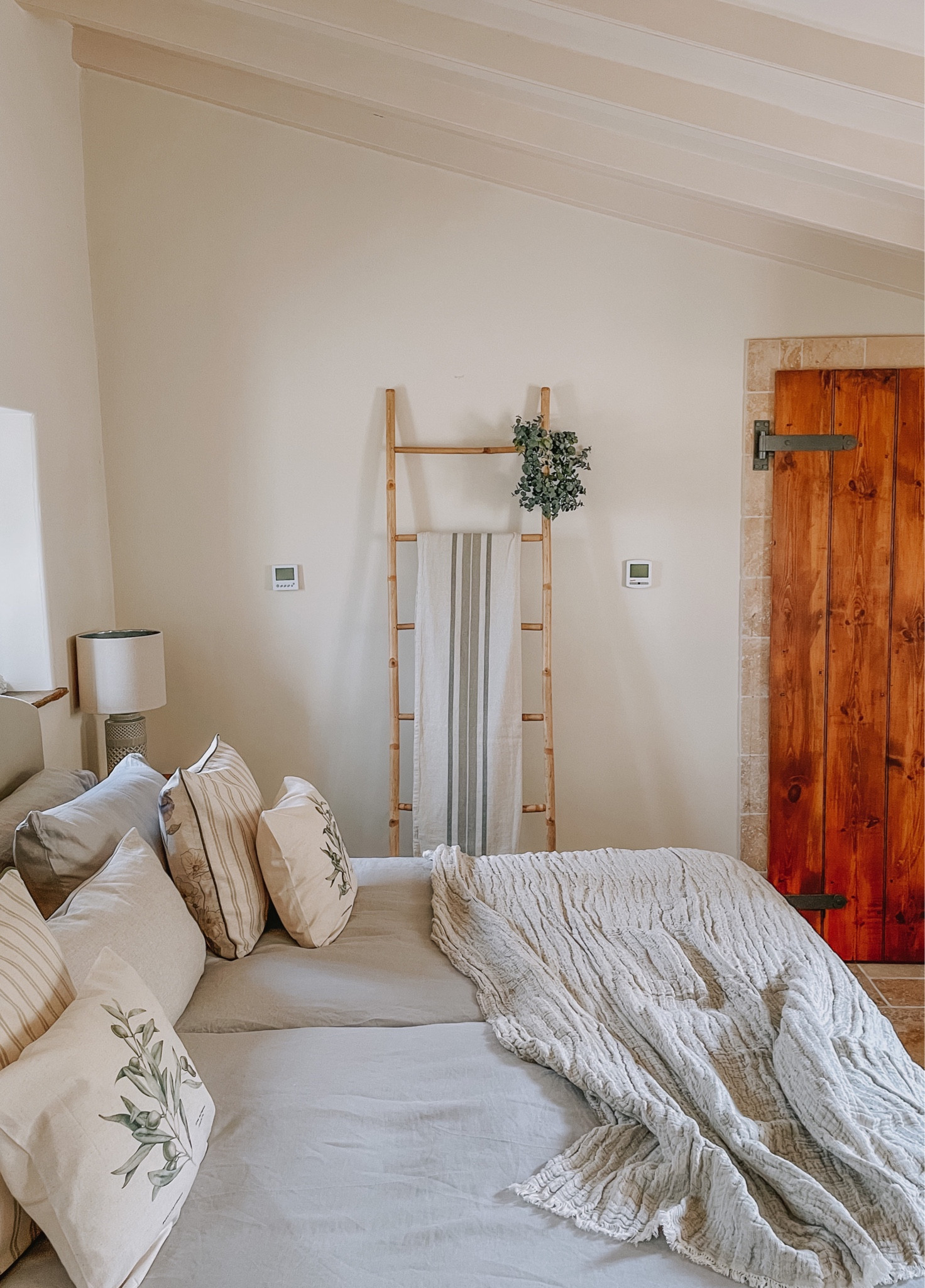 Cottage country bedroom bedlinen neutral interiors country interiors bedroom decor linen bamboo ladder throws cushion covers eucalyptus wreath 

#LTKhome #LTKSeasonal #LTKeurope