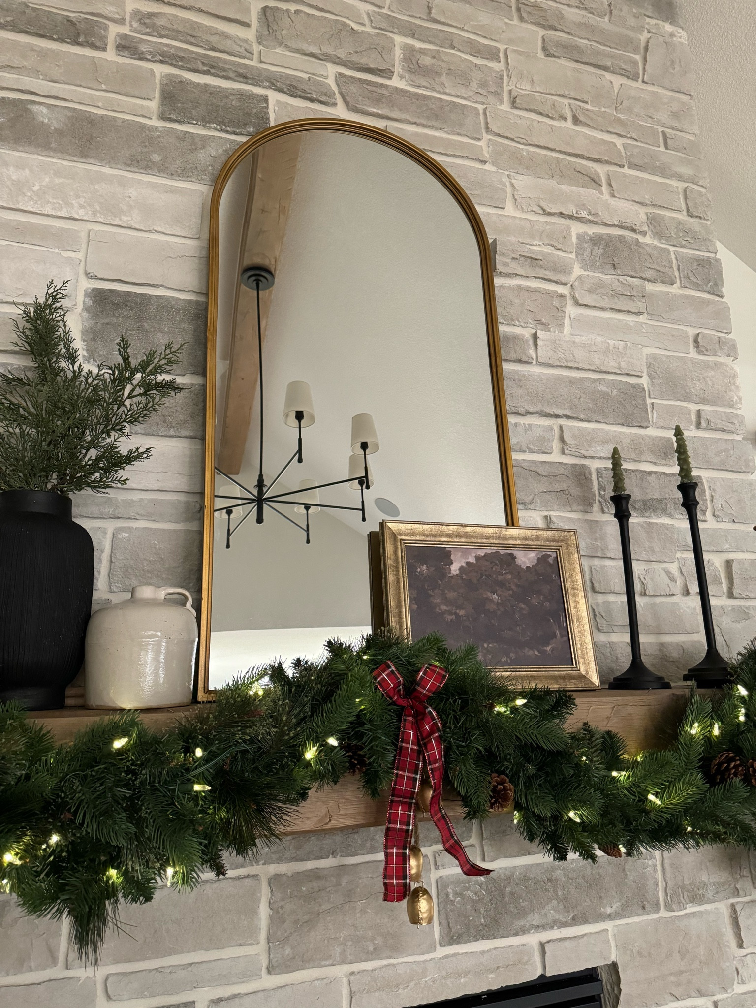 Post-Christmas mantel ❤️ Not ready to get rid of the lights or the red plaid. I think it’s neutral enough to take through the winter! 

#LTKSeasonal #LTKfamily #LTKhome