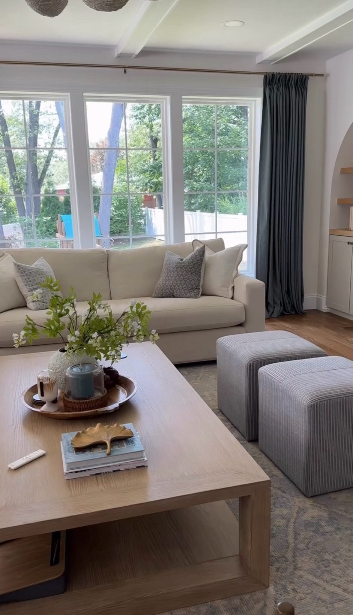 Family room views✨ This coffee table is one of my favorites, it’s solid wood and will last forever. And of course my favorite designer look for less curtains!

#LTKHome