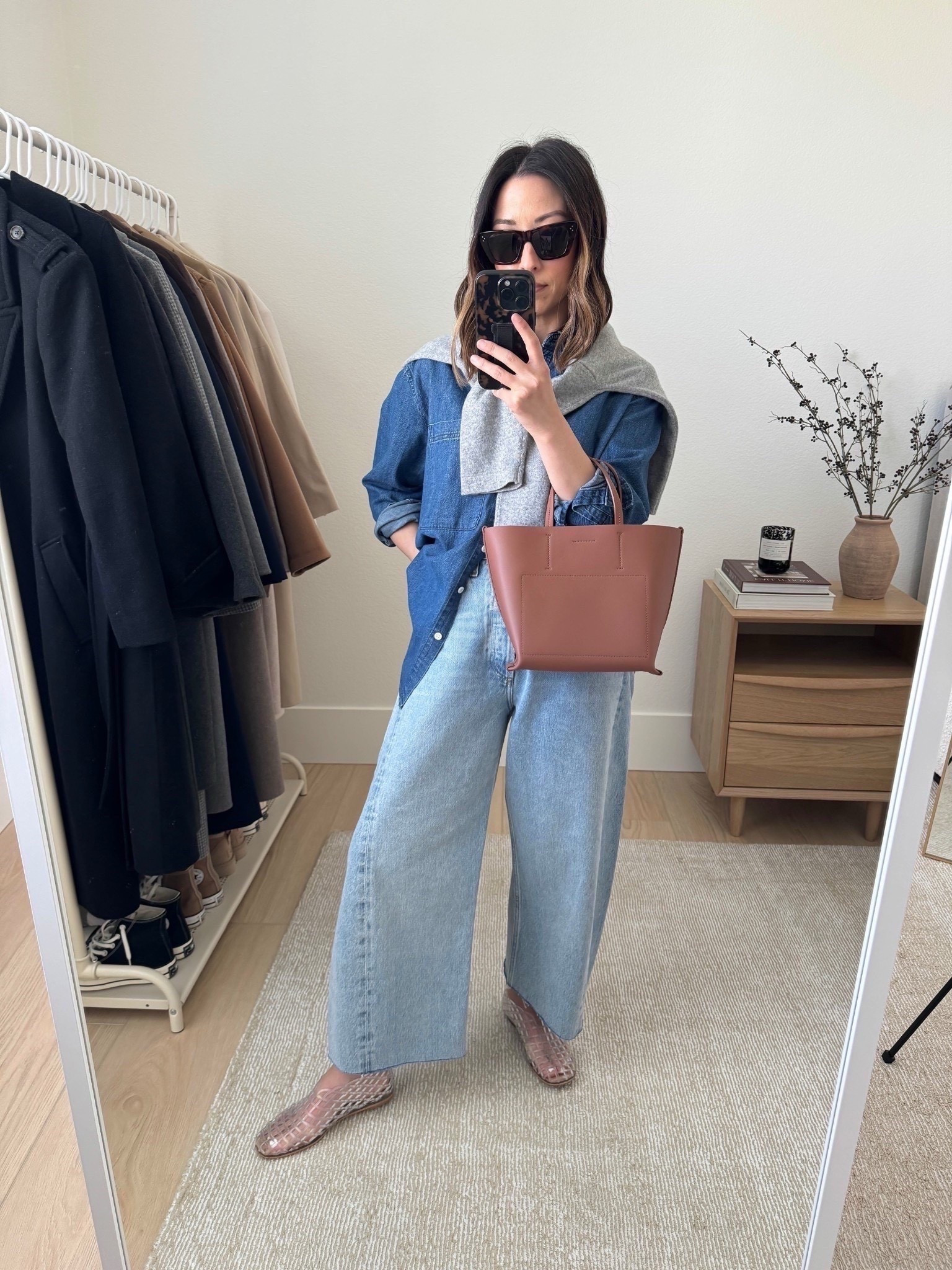Spring outfits with denim shirts. 

This is truly the best denim shirt. Perfectly oversized, amazing color, and drapes beautifully. 

AYR shirt xs
AGOLDE Barrel jeans 25. Cut hems
Amazon Jelly flats 5.5
Everlane bag
Everlane sweater xs
Celine sunglasses

Petite style, spring outfits, spring style 

#LTKPetite #LTKmomlife #LTKootd