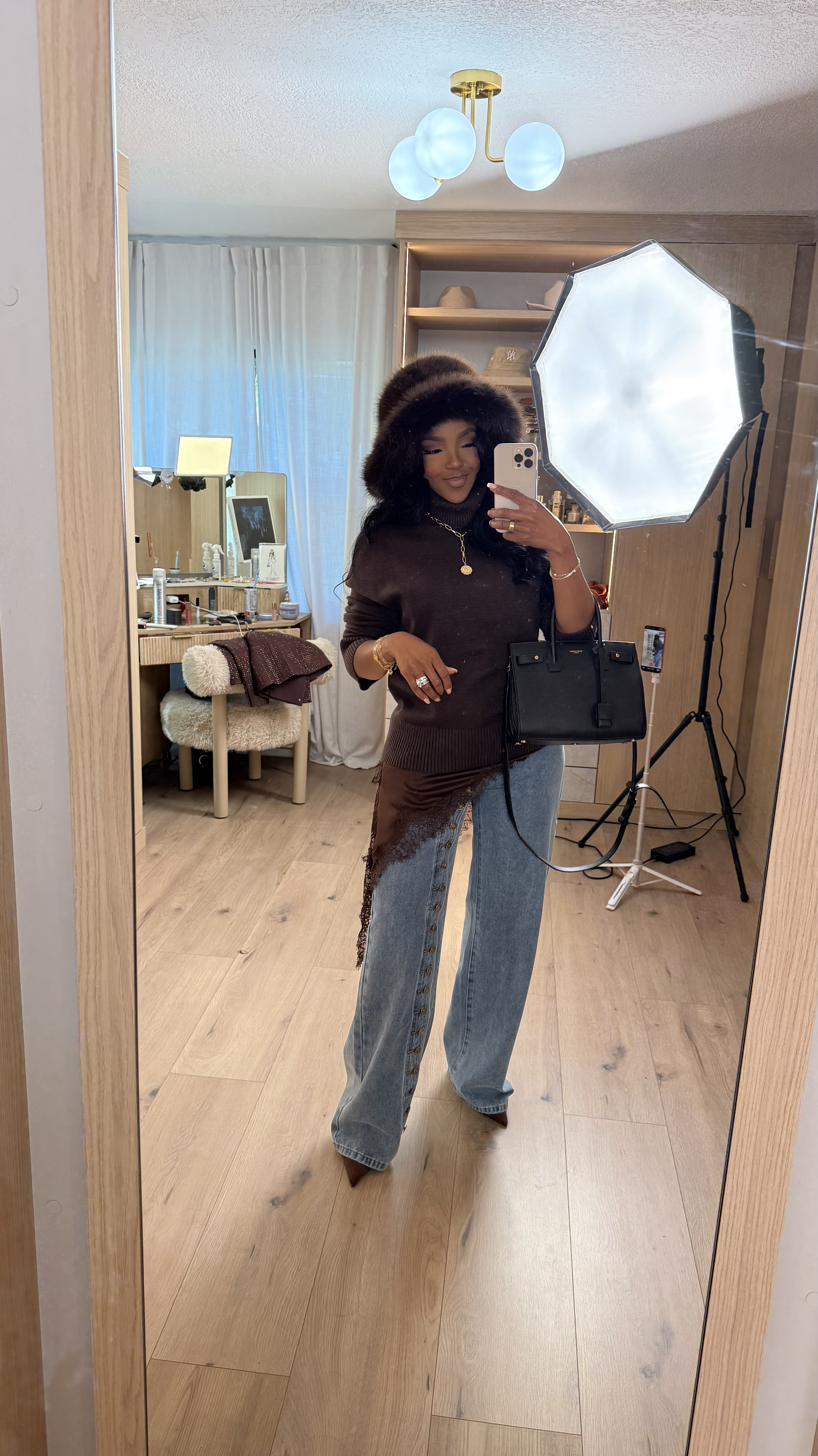 Elevated everyday layers with rich textures and effortless balance. This look blends cozy and polished pieces that feel put-together without trying too hard. An easy example of mixing casual denim with statement details for a chic, wearable outfit.

Perfect for casual errands, brunch dates, coffee runs, or everyday styling.

📏 Sizing & Fit:
Top: Size Small  
Jeans: 27 Long  
Hat: One size  
Bag: One size  

Measurements: 5'4", 138 lbs, 34D bust, 27" waist, 40" hips  

Styled multiple ways to maximize wear — classic pieces like these make the cost per wear drop over time and fit seamlessly into a long-term shopping strategy.  

Tap to get details and save this look for later inspiration.  

Follow me on Instagram and YouTube @kirasfashionfinds