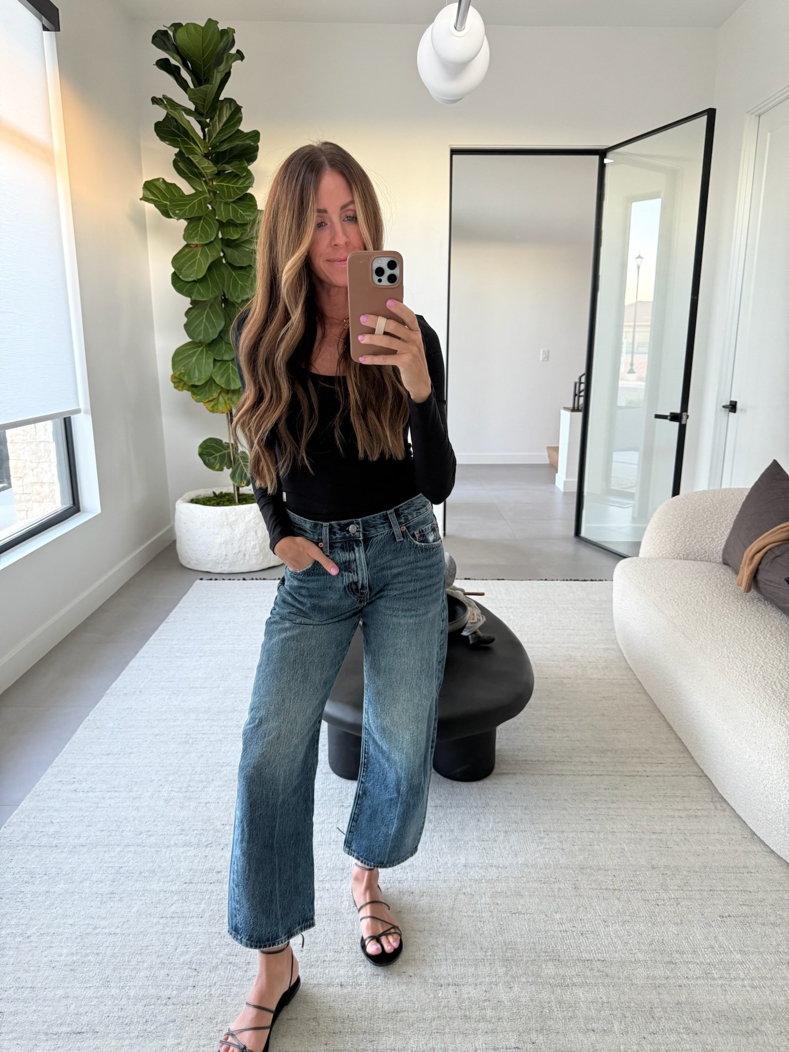 Can’t go wrong with a classic black scoop tee!