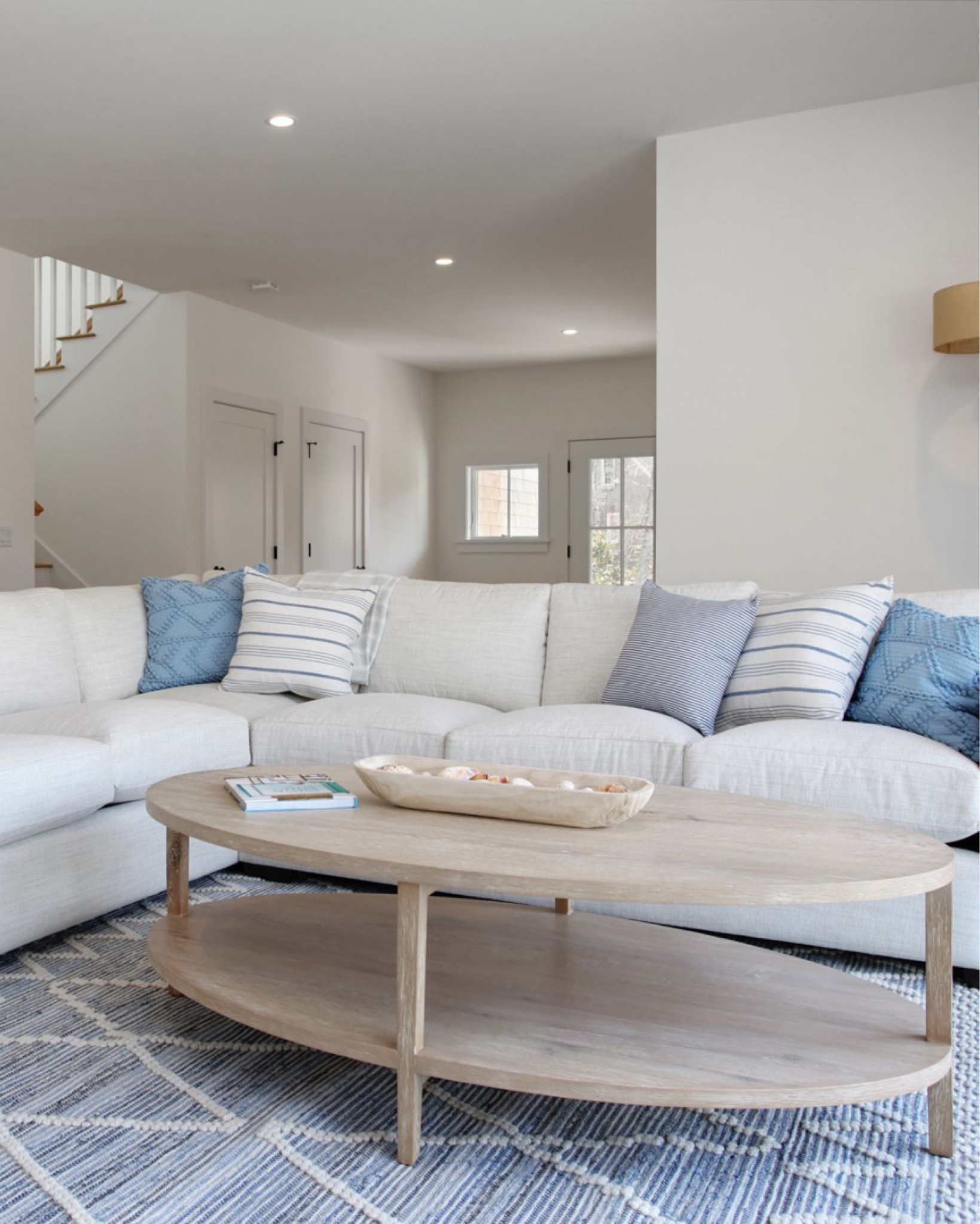 The most calming, soothing colors in the main living room at the Making Waves beach house rental on Cape Cod. Link to this gorgeous 4 bed, 3.5 bath beach house rental is in my IG bio! Mention Casually Coastal during the booking process for a free gift card to Osterville Fish Too!

Unable to link the sectional but it’s from Boston Interiors!
-
home decor, coastal decor, beach house decor, beach decor, beach style, coastal home, coastal home decor, coastal decorating, coastal interiors, coastal house decor, home accessories decor, coastal accessories, beach style, blue and white home, blue and white decor, neutral home decor, neutral home, coastal living room, coffee table decor, serena & lily rugs, living room rugs, blue & white rugs, coastal rugs, rugs on sale, textured rugs, cape cod beach house, blue & white pillows, wood bowls, decorative bowl, bowl filler.

#LTKunder100 #LTKunder50 #LTKhome
