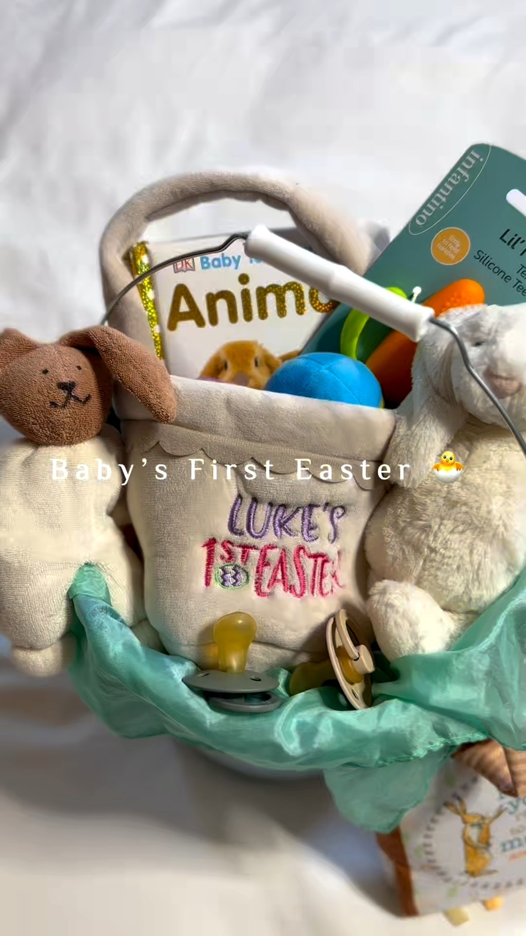 Baby’s first Easter basket 🐣🤍

Sharing a simple, baby boy Easter basket idea that’s sweet, practical, and meaningful for year one. His personalized “Luke’s 1st Easter” plush basket is tucked inside a 2-gallon Target Easter bucket (budget-friendly and reusable), layered with a giant Sarah’s Silks playsilk — one of our favorite open-ended toys that grows with them (my 7-year-old still plays with his).

Inside I added an Infantino carrot teether for teething babies, a BIBS natural rubber pacifier (some glow in the dark), a DK Baby Touch & Feel board book, the Guess How Much I Love You soft book for stroller walks and car rides, and a small Bashful Bunny Jellycat — the cutest baby’s first Easter keepsake.

If you’re building a baby Easter basket, newborn Easter basket, or toddler Easter basket, this is such an easy mix of keepsake + practical baby essentials.

Linked this exact baby Easter basket setup plus more Easter basket ideas for babies 👶🏼 

@Target #jellycat 

#LTKmomlife #LTKBaby #LTKSeasonal