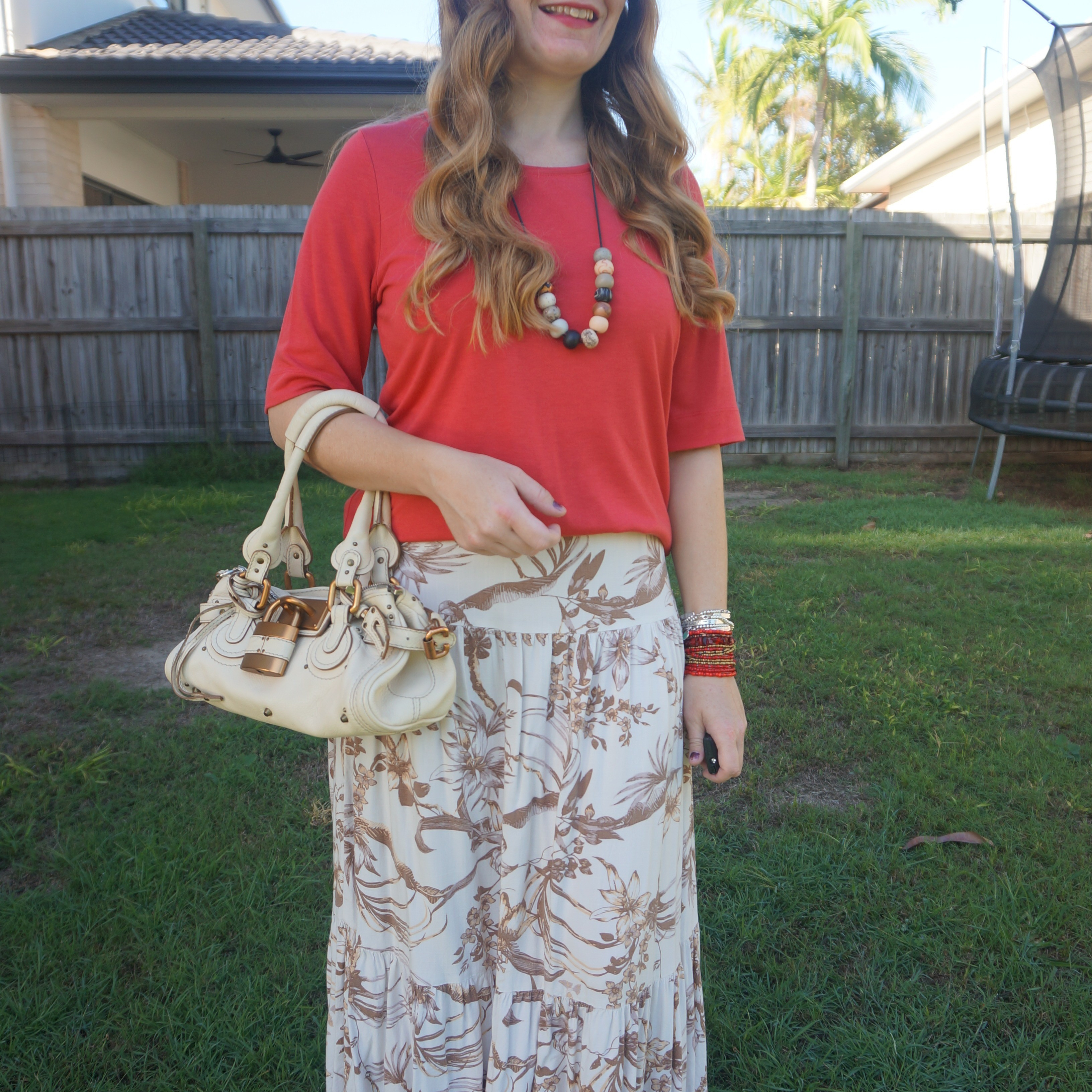 Red tee, Kmart anko floral maxi skirt with small cream Chloe Paddington bag ❤️

#LTKaustralia #LTKautumn #LTKbag