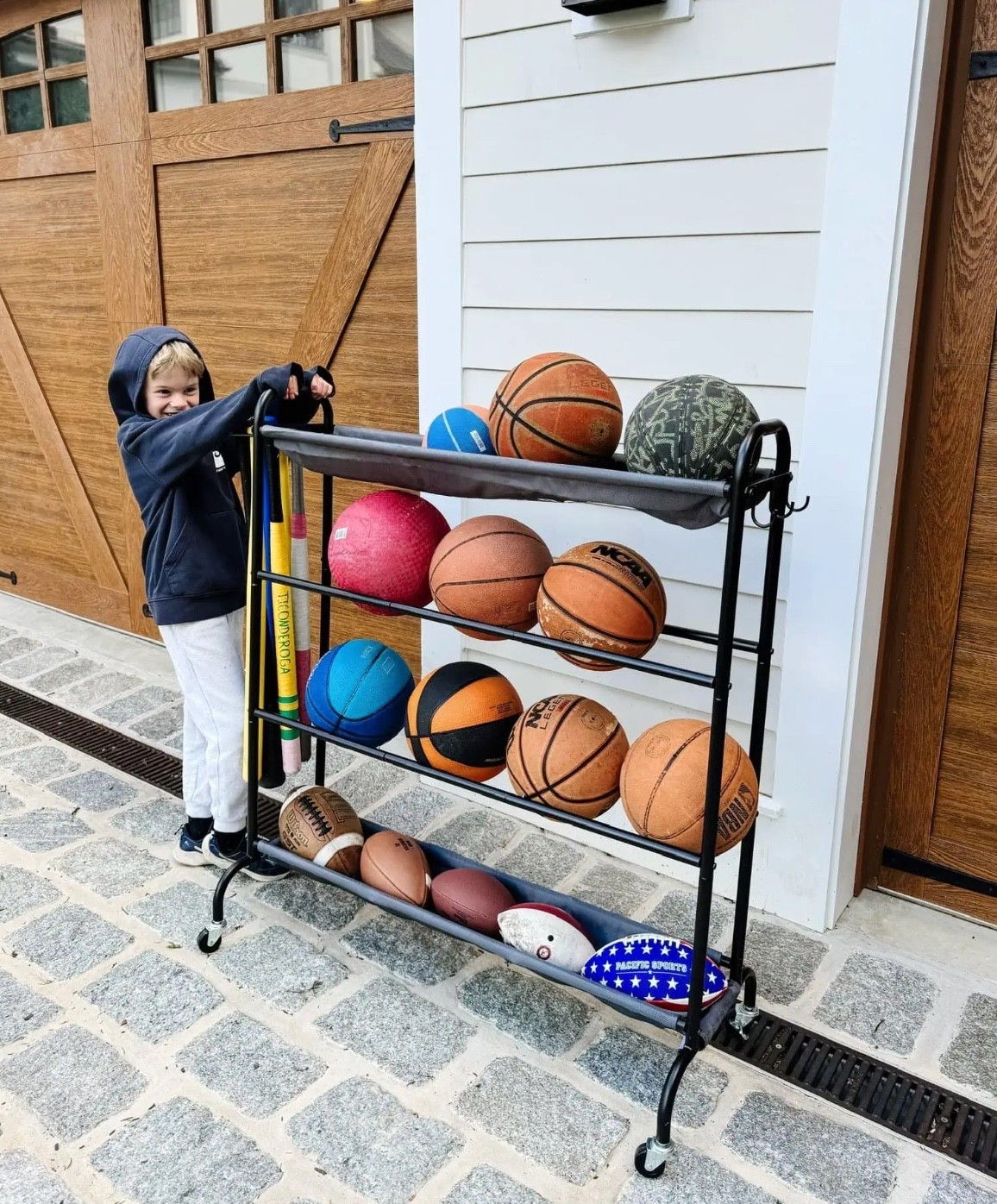 Start planning for warmer weather and outdoor play during Spring Cyber Week with savings up to 80% off and free shipping! Sharing a few organization items that help give all the outdoor toys a home! #ad #WayfairPartner #Wayfair @Wayfair 