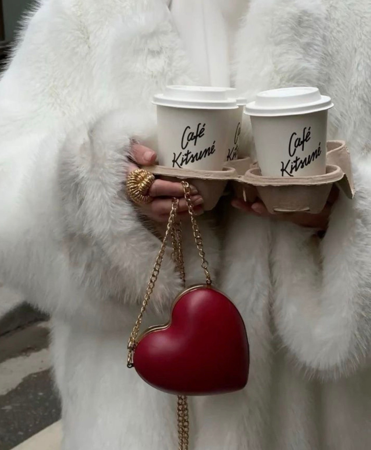 A coffee run, but make it fashion. ❄️☕
Snowy streets, a plush fur coat, statement bag rings, and coffee from Café Kitsuné—because winter errands deserve main-character energy.

winter coffee run outfit, bag rings trend, bag accessories styling, fur coat winter outfit, cozy glam winter style, chic winter accessories, luxury street style, cold weather fashion, everyday outfit elevated, Pinterest fashion inspo, LTK winter style

#LTKdayinmylife #LTKgrwm #LTKootd