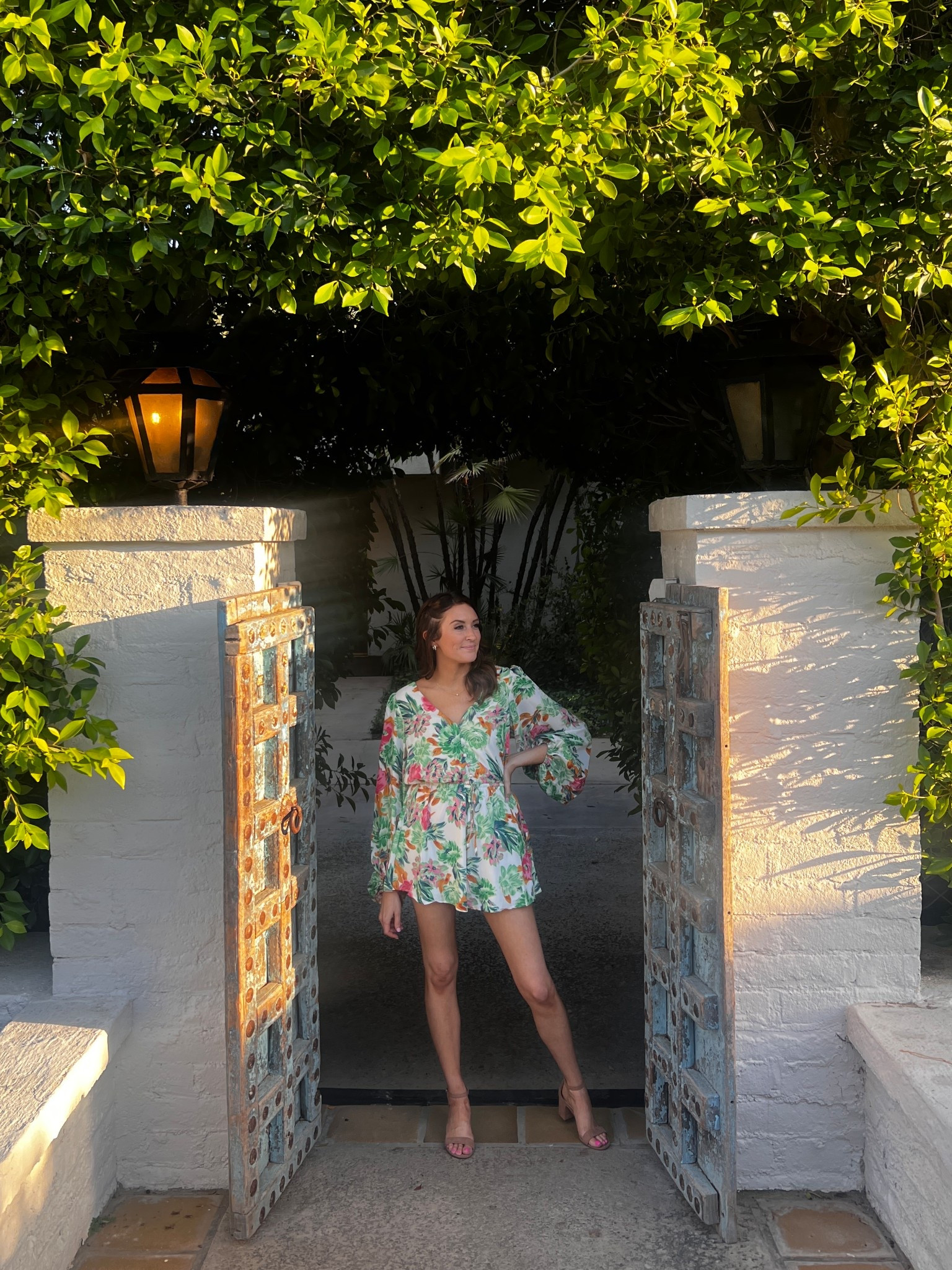 Palm Springs ready in this petal and pup romper 