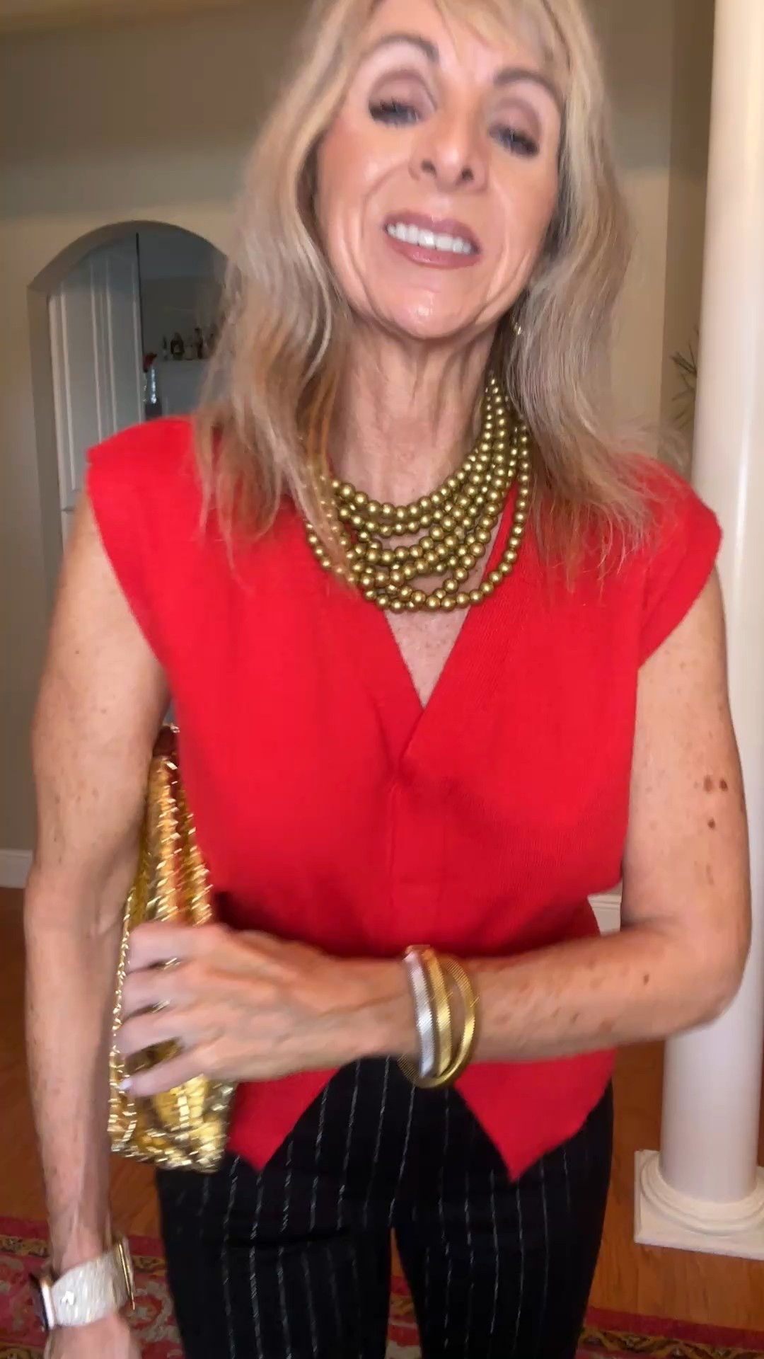 Date night outfit. Love these flare leg jeans from Loft; the pinstripe elongates the leg. The red sweater vest is festive. Wearing my true size in these. 

#LTKOver40 #LTKFindsUnder50 #LTKSaleAlert