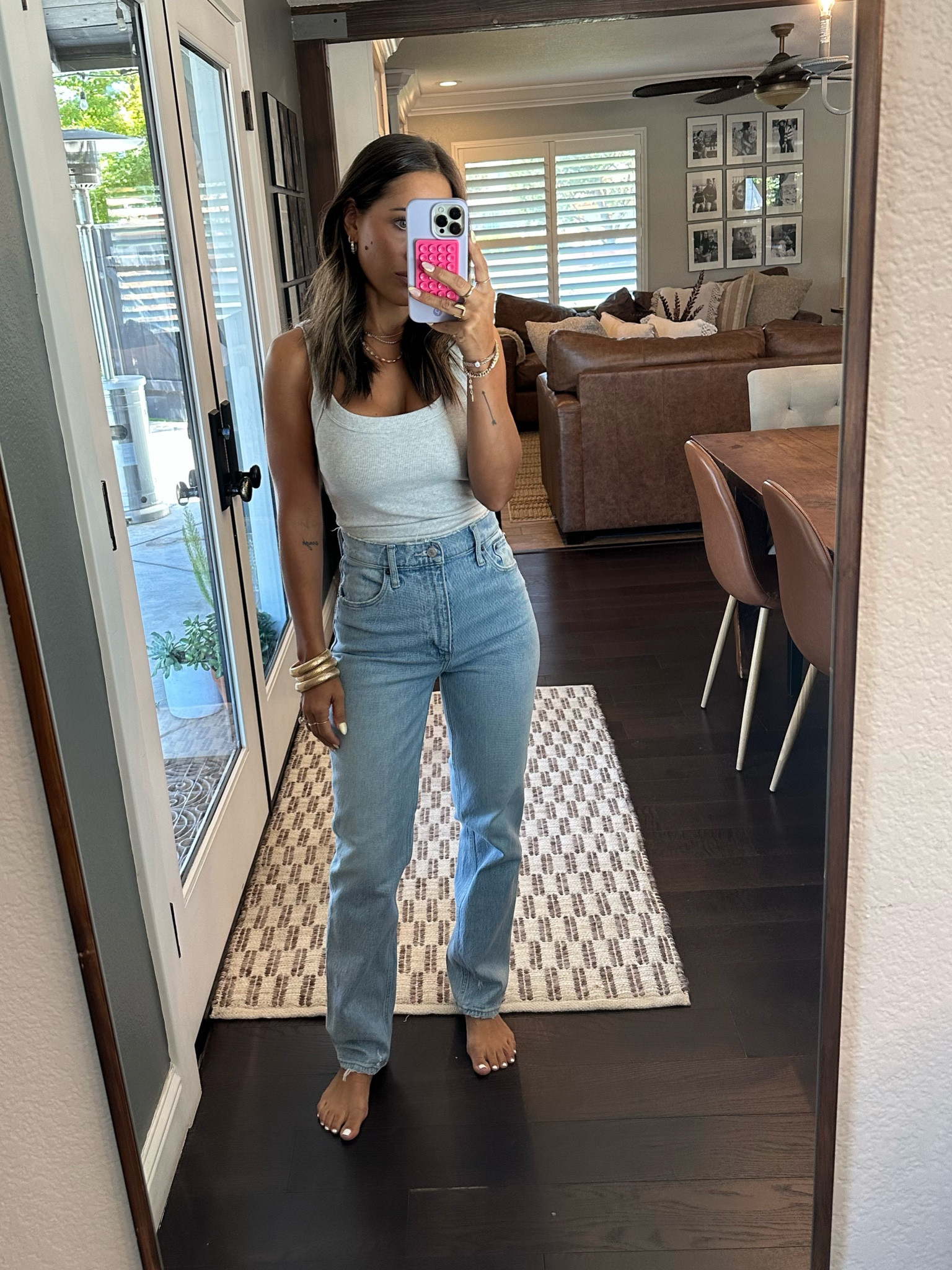 Ultra high rise 90s straight jean.  Wearing size 25 in color light 