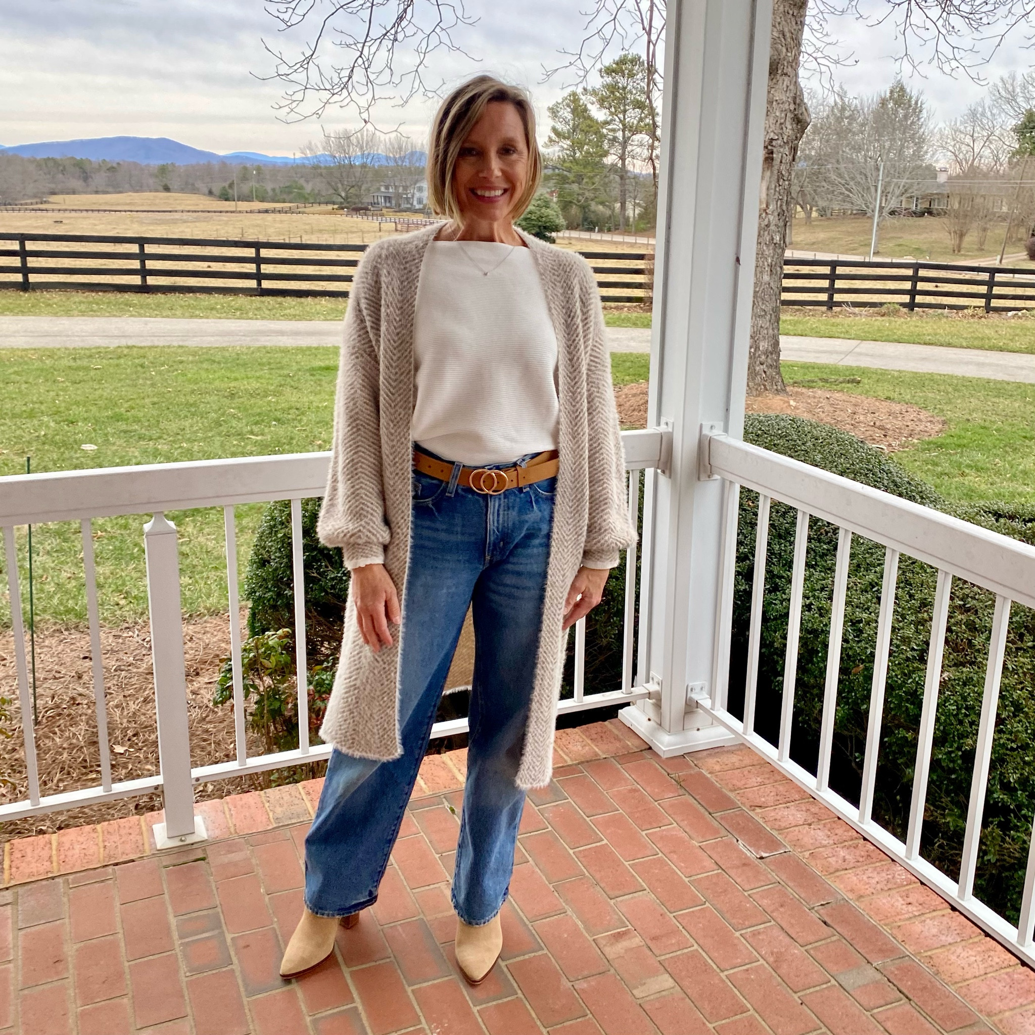 Do you see the soft pattern on this sweater? It’s beautiful! I’m wearing my regular size of small. The shirt has bat wing sleeves and It’s offered on one size. This one is white. I have it in several colors, it’s that good. The jeans are a baggy cut and run big. I normally wear a 4 but sized down to a 2. The shirt, sweater and belt (2-pack) are all on sale!

#LTKfindsunder50 #LTKstyletip #LTKsalealert