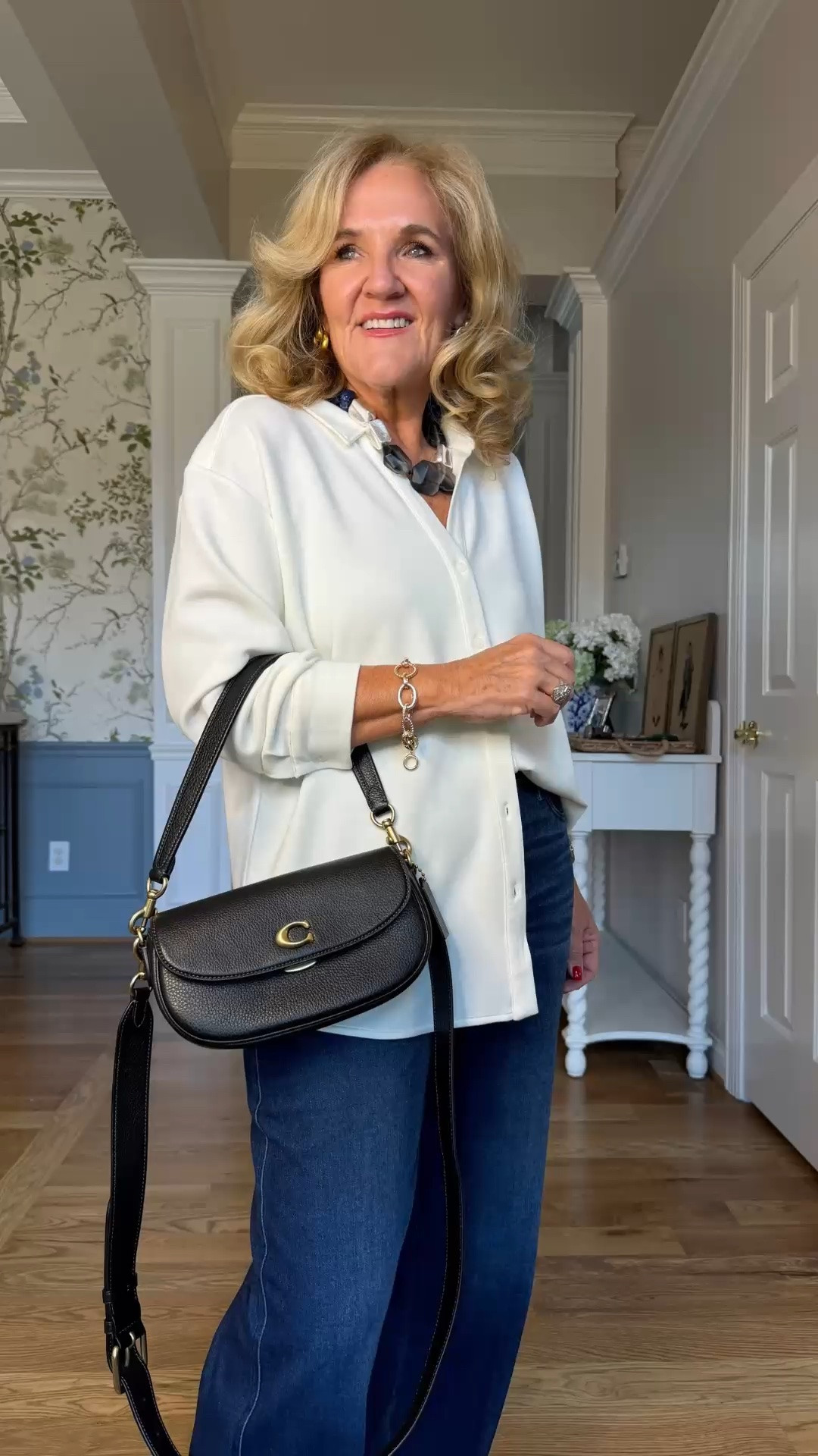 A crisp ivory button-front jacket is such a versatile layer for everyday dressing. Paired with dark denim and a classic black shoulder bag, it creates a clean, polished look that feels comfortable without being overly dressed. This is an easy combination for lunch, errands, travel, or casual days when you want to look pulled together.

💡 LTK MADE EASY
❤️ Heart = Support my posts!
🔖 Save = Get sale & restock alerts
📋 Lists = Keep favorites organized
📲 Share = Send lists and products to a friend. Hello, Christmas List!
💬 Comment = Ask me anything about what I'm wearing.:-)

#LTKootd #LTKWorkwear #LTKOver40