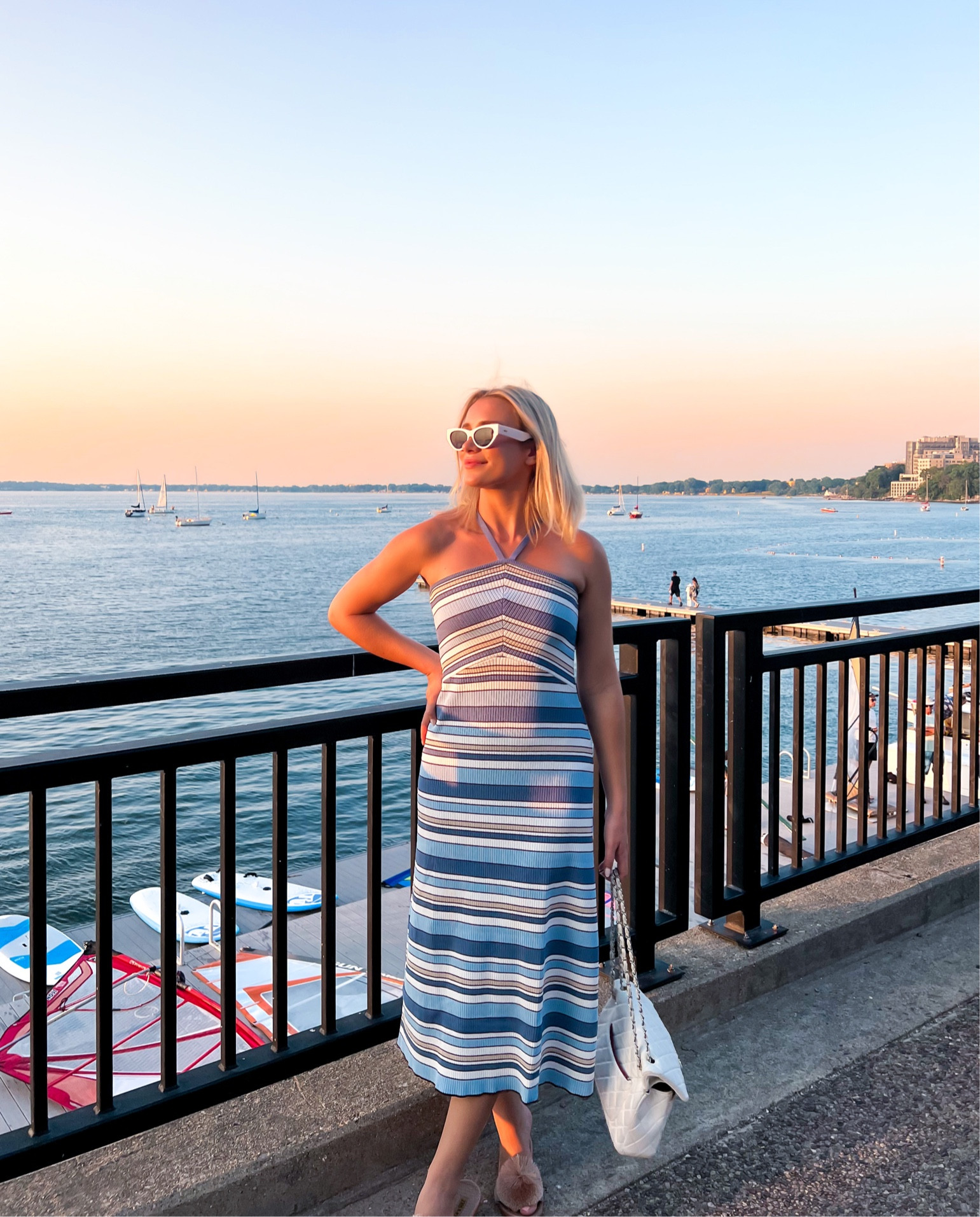 The perfect sundress for enjoying sunset at the lake or a casual wedding, I’m wearing a size small. If you have a larger chest, this may not work for you since it’s tighter up top. 

P.S. My white sunglasses are on sale!!👏🏻

#LTKsalealert #LTKFind #LTKSeasonal