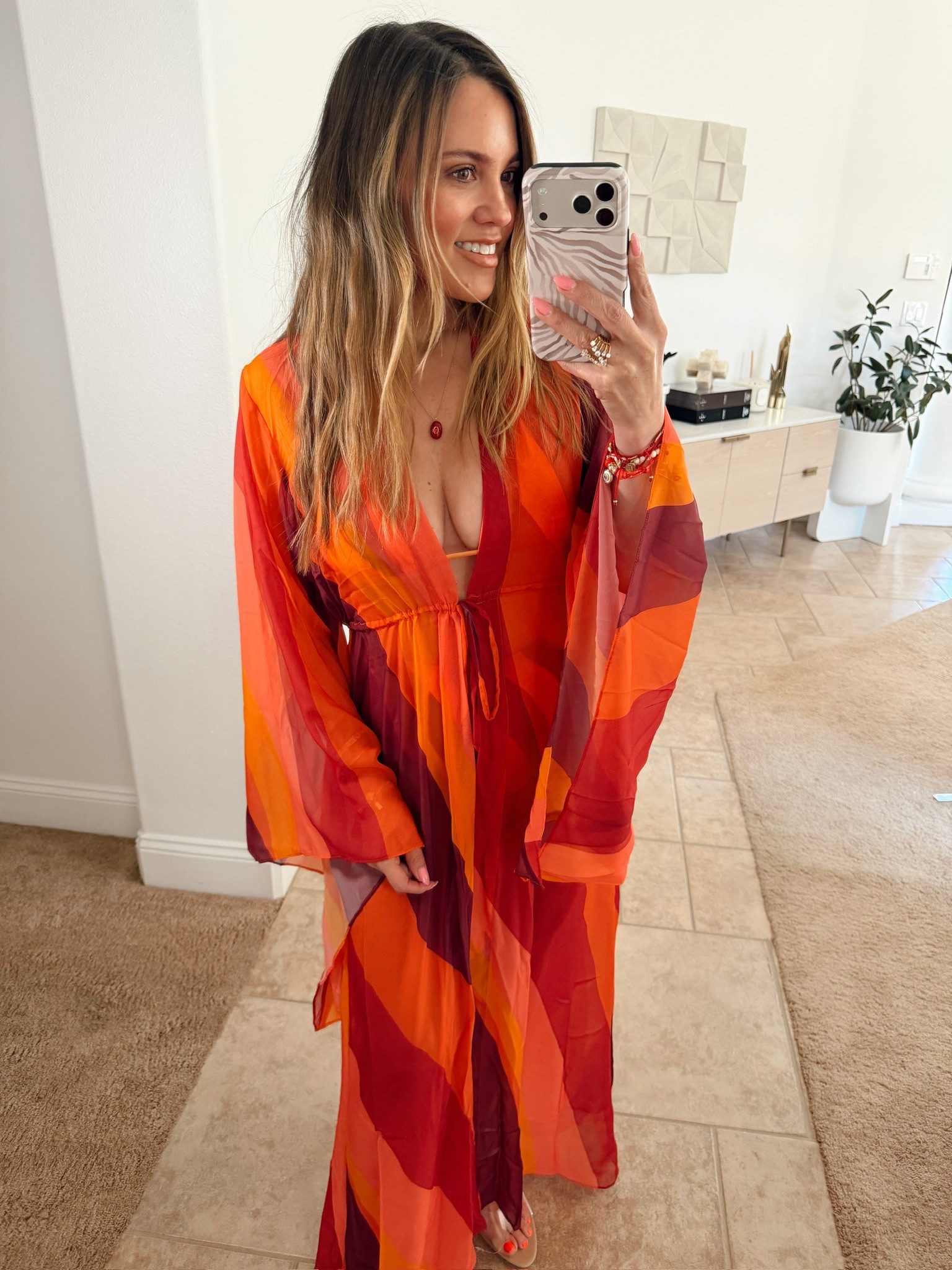 The most flattering swimsuit and matching cover up!!! the colors are SO good