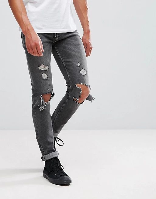 ASOS – Enge Jeans in verwaschenem Schwarz mit großen Rissen und sichtbarem Reißverschluss | Asos DE