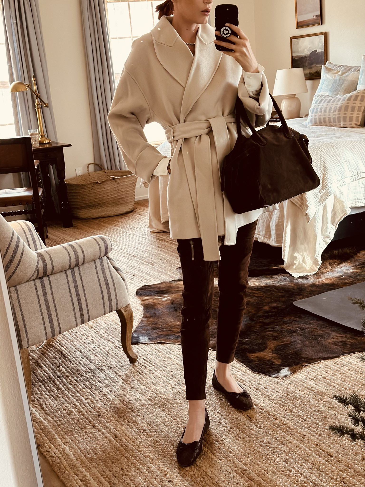 Tonight we hosted a Christmas dinner for the Box Ranch team and I wore several new pieces to the event. 
I have had these chocolate suede legging pants for years and never had the right accessories for them so I’m just wearing them. 
I got this brown suede bag, inspired by The Row, and also these Bottega inspired ballet flats - I love to coordinate my bags and shoes 😍
I added some fresh accessories and embraced the quiet luxury trend.


#LTKtravel #LTKworkwear #LTKover40