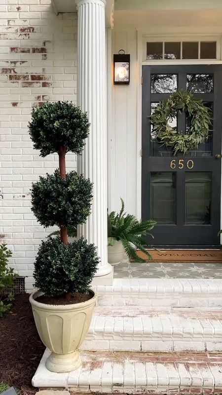 Front porch refresh! Our planters are out of stock, but linking in case you want to find some thing similar or they come back in stock! 

#FrontPorchRefresh #Fern #OutdoorPlant #FrontDoorWreath #SpringWreath #FrontDoorGreenery #Topiary 

#LTKSeasonal #LTKhome
