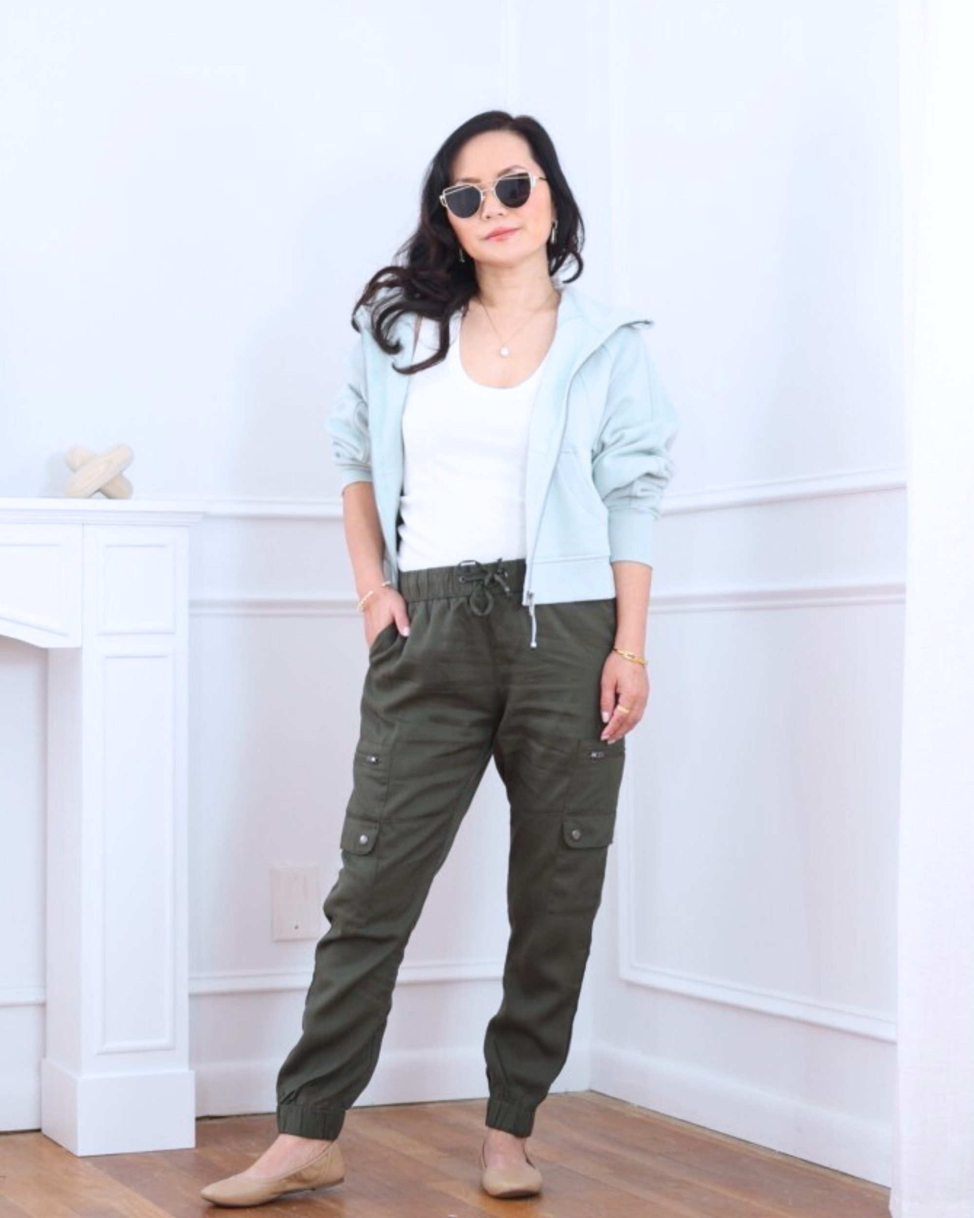 Casual with a polished twist — a full-zip hoodie from Lululemon layered over a white tank, paired with Banana Republic Factory cargo joggers and Amazon ballet flats for an easy, everyday look that’s comfy but still pulled together. I’m 5’2, wearing size XS.

#LTKOver40 #LTKootd #LTKPetite