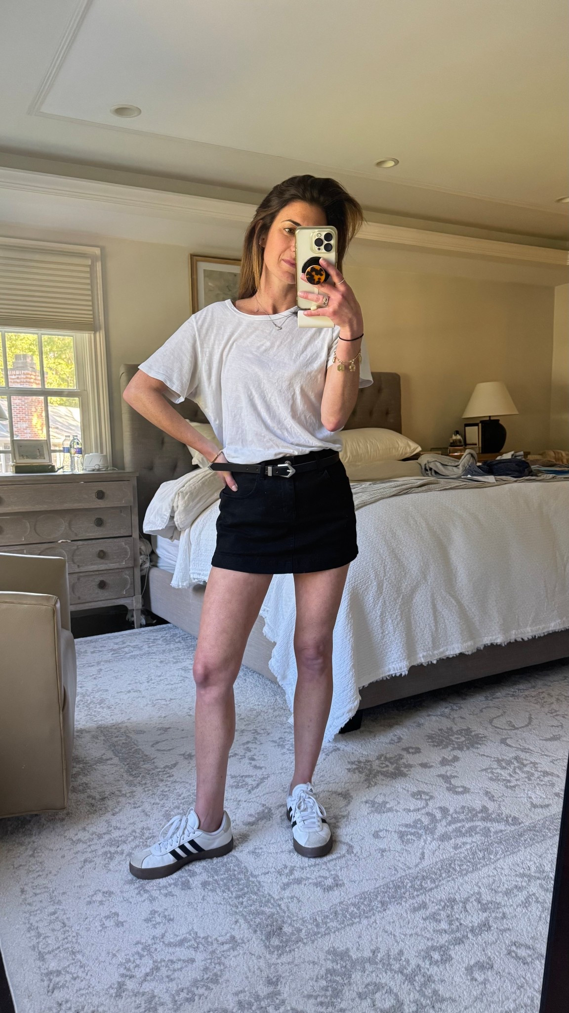 Fall denim skort sneakers adidas white tee classic black leather belt 

#LTKFallSale #LTKPetite #LTKStyleTip