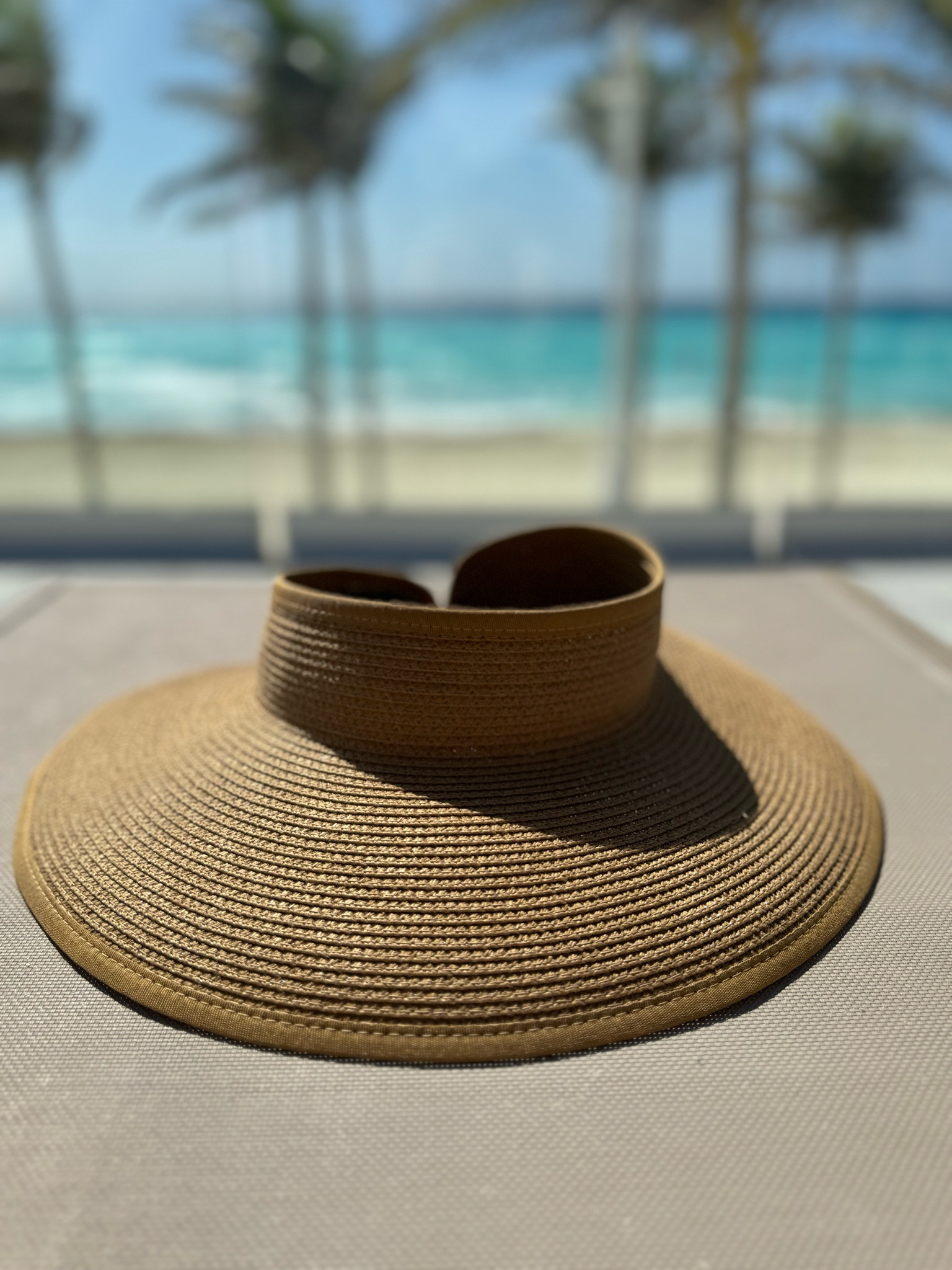 The best beach visor. This is adjustable and doesn’t blow away in the wind. Rolls up perfectly for traveling, too. 👍🏻

#LTKTravel #LTKSwim