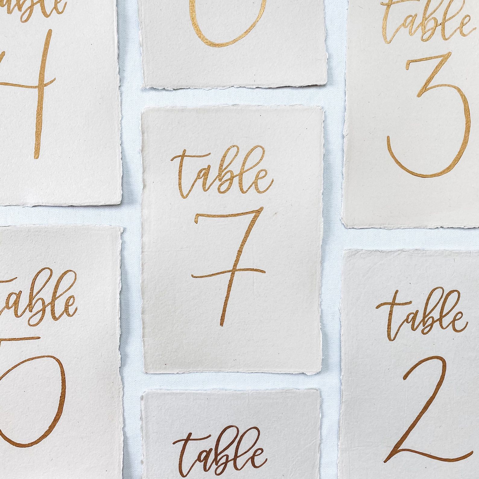 Gold Calligraphy table numbers on hand made paper gold | Etsy | Etsy (US)