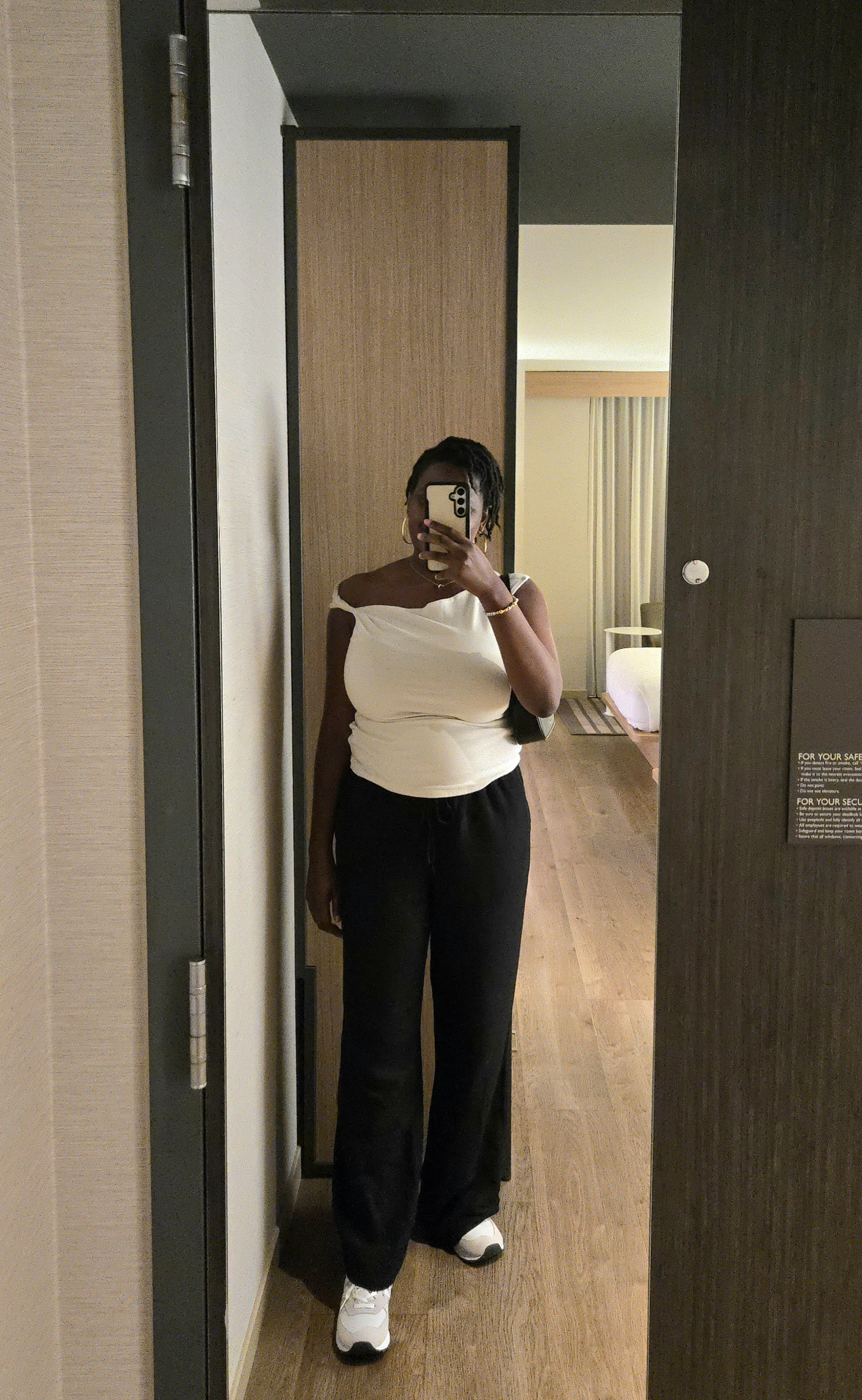 Casual travel outfit exploring DC on vacation. White off the shoulder top from Gap Factory (L), Black linen pants (L), and New Balance sneakers (9).

#LTKFindsUnder100 #LTKStyleTip