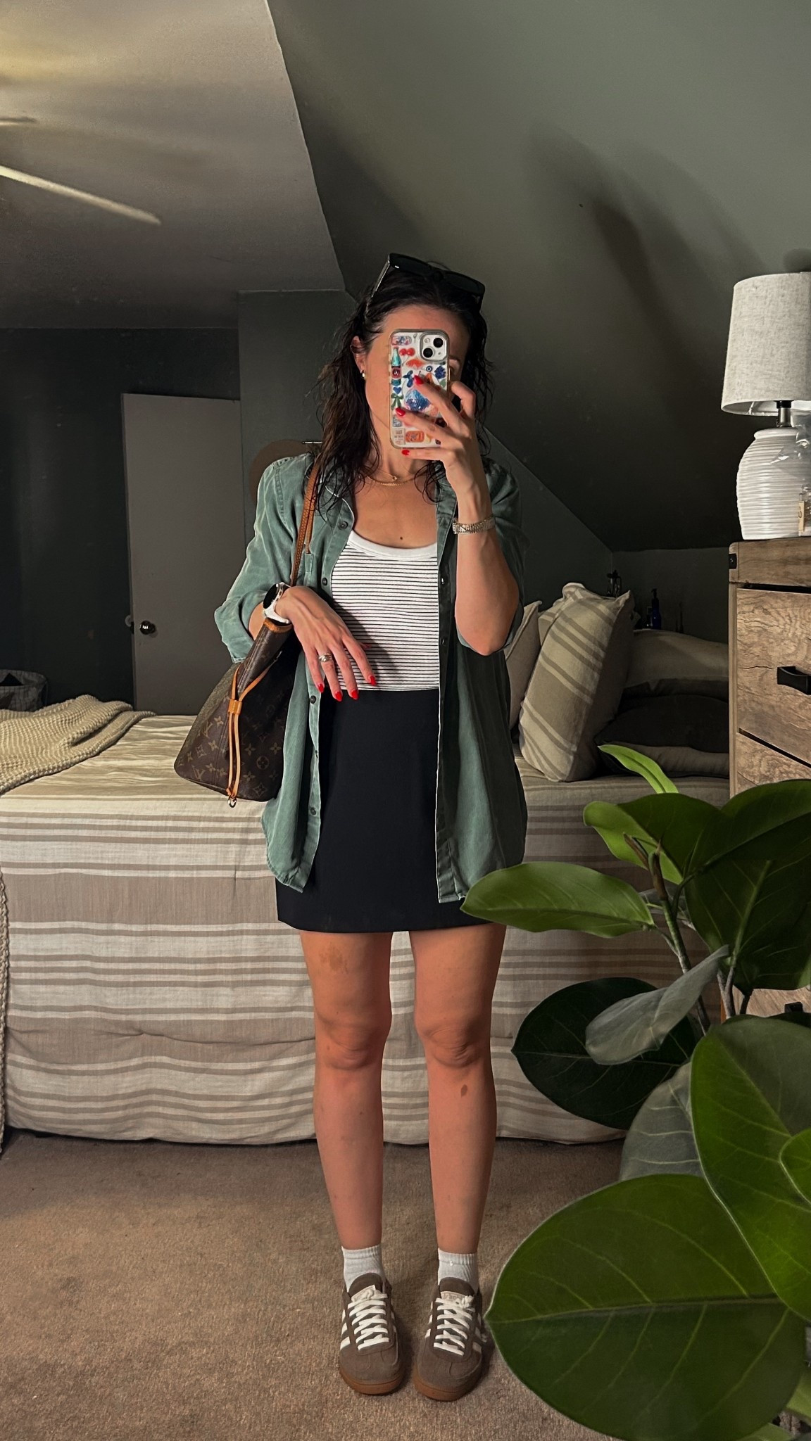 early fall outfit 🍁 featuring my absolute FAVORITE black skort of all time. so flattering and can style a ton of different ways. I do my usual size S. Exact striped shirt is Zara but linked similar!

#LTKSeasonal #LTKFindsUnder100 #LTKStyleTip