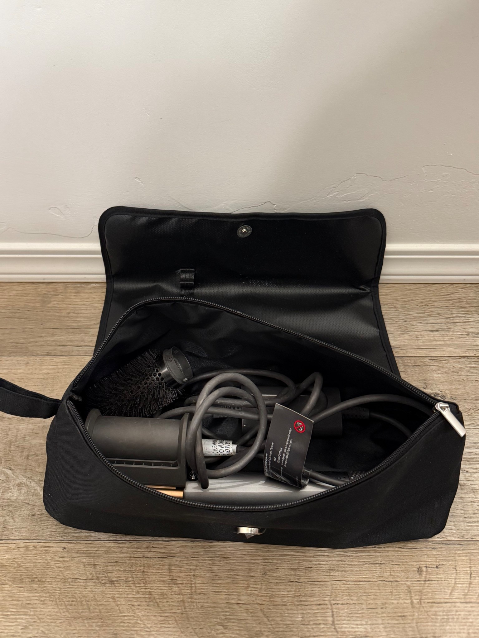 Such a good deal! Picked my sister and I up this hair tool bag with a hot pad at the Target Bullseye section. 