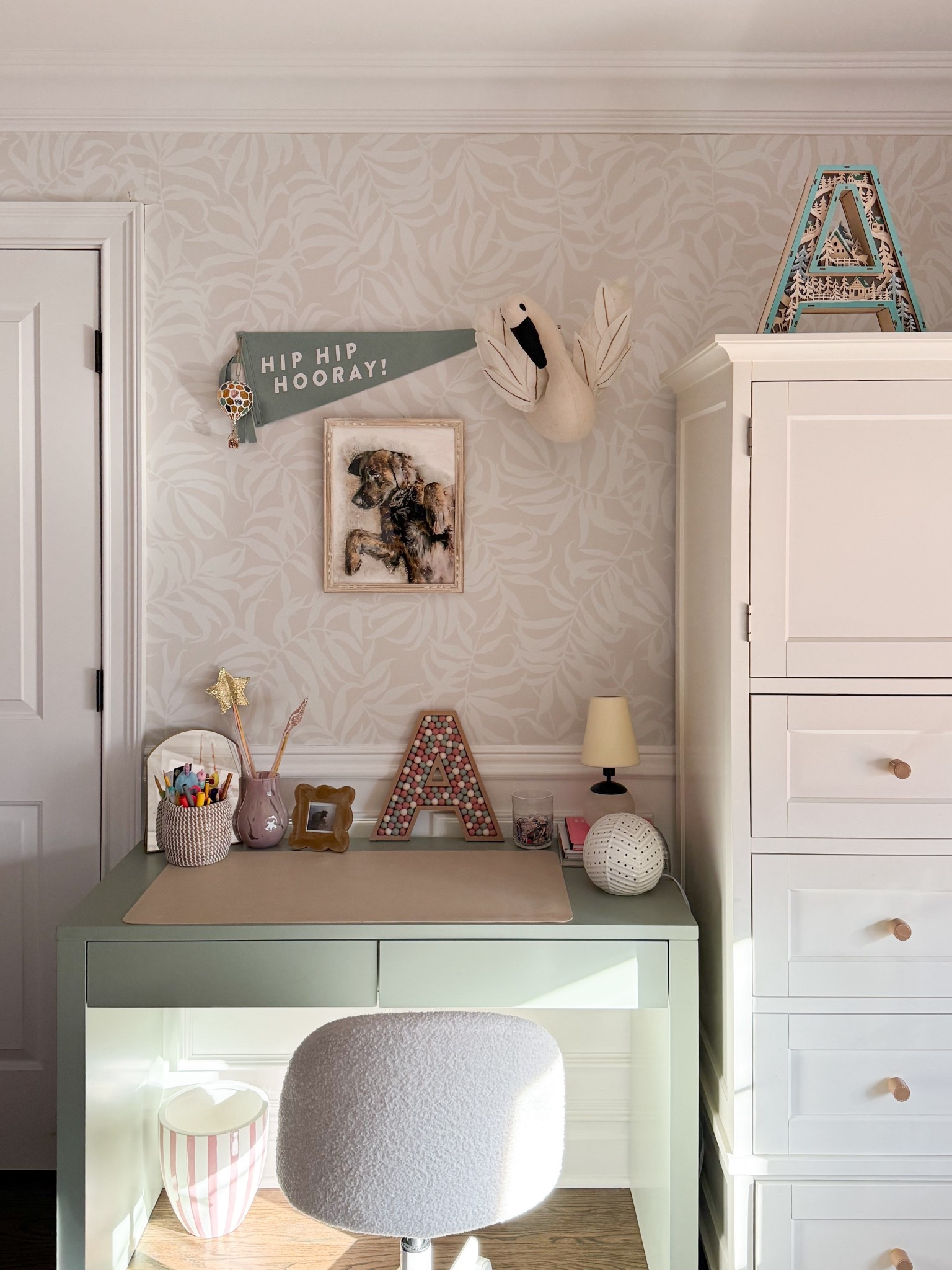 Ava’s little study corner 🩶

The perfect sage green parsons desk, boucle chair, peel-and-stick wallpaper, art, and desk accessories 🙌🏻

#LTKHome #LTKdayinmylife #LTKKids