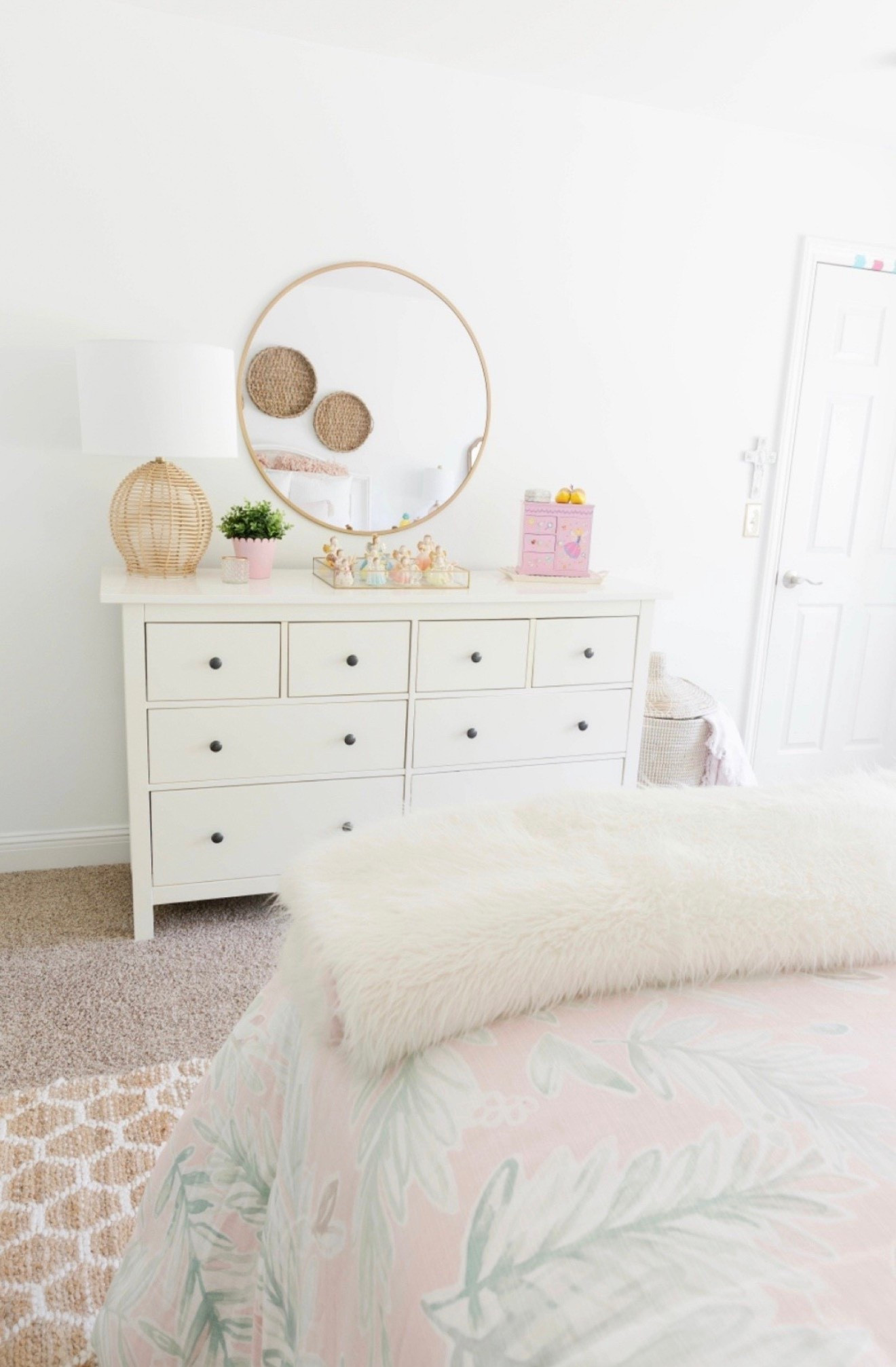 This pink and white girls bedroom is cute without being cluttered. A super affordable white dresser, jute rug and round mirror all complete the look! 
#LTKFindsUnder50 



#LTKHome #LTKvlog #LTKOver40
