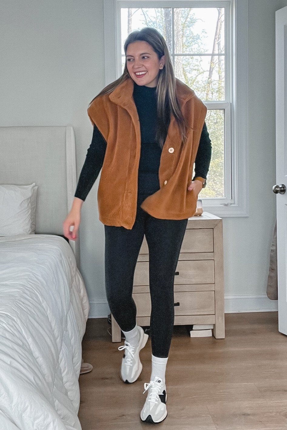 Athleisure. Oversized fleece vest Amazon. Size down. Black turtleneck, favorite black leggings, new balance 327. New balance neutral sneakers. 

#LTKunder100 #LTKstyletip #LTKunder50
