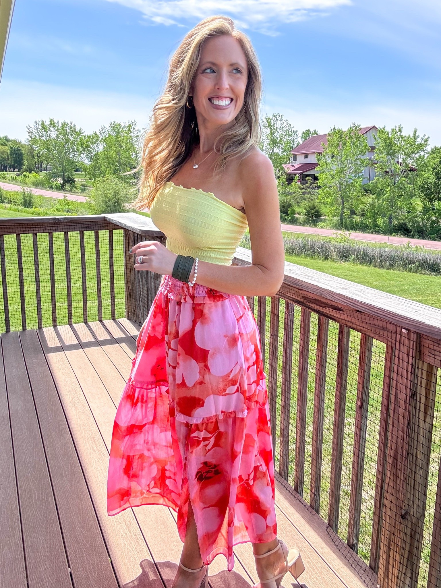 Always love a fun colorful look in spring and summer! ☀️ This yellow textured tube top is so cute and loving this pink floral print maxi skirt! Wearing an xsmall in the top and small in the skirt.

As an Amazon Influencer I earn commission on qualifying purchases.

Spring fashion 2026, colorful summer outfit idea, mom style, yellow tops, pink floral print maxi skirt, shopping day outfit inspo, summer wedding guest inspo

#LTKOver40 #LTKMidsize #LTKootd