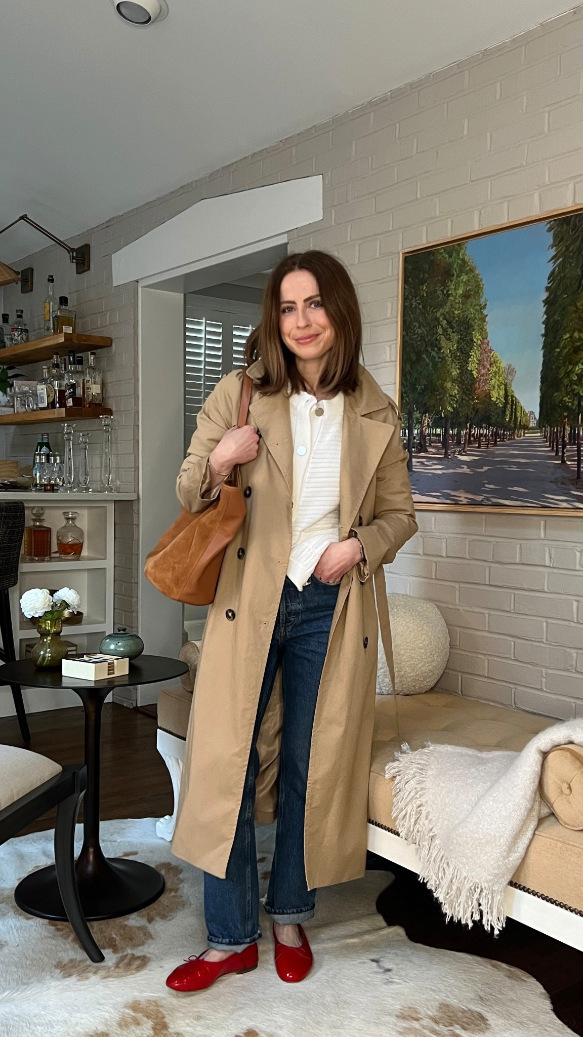 Styling a trench coat for spring 

Knit cardigan (linked similar)
Agolde Lana Denim
Suede tote (linked similar)
Trench coat (linked similar)
Mansur Gavriel red ballet flats 

#LTKStyleTip #LTKSeasonal