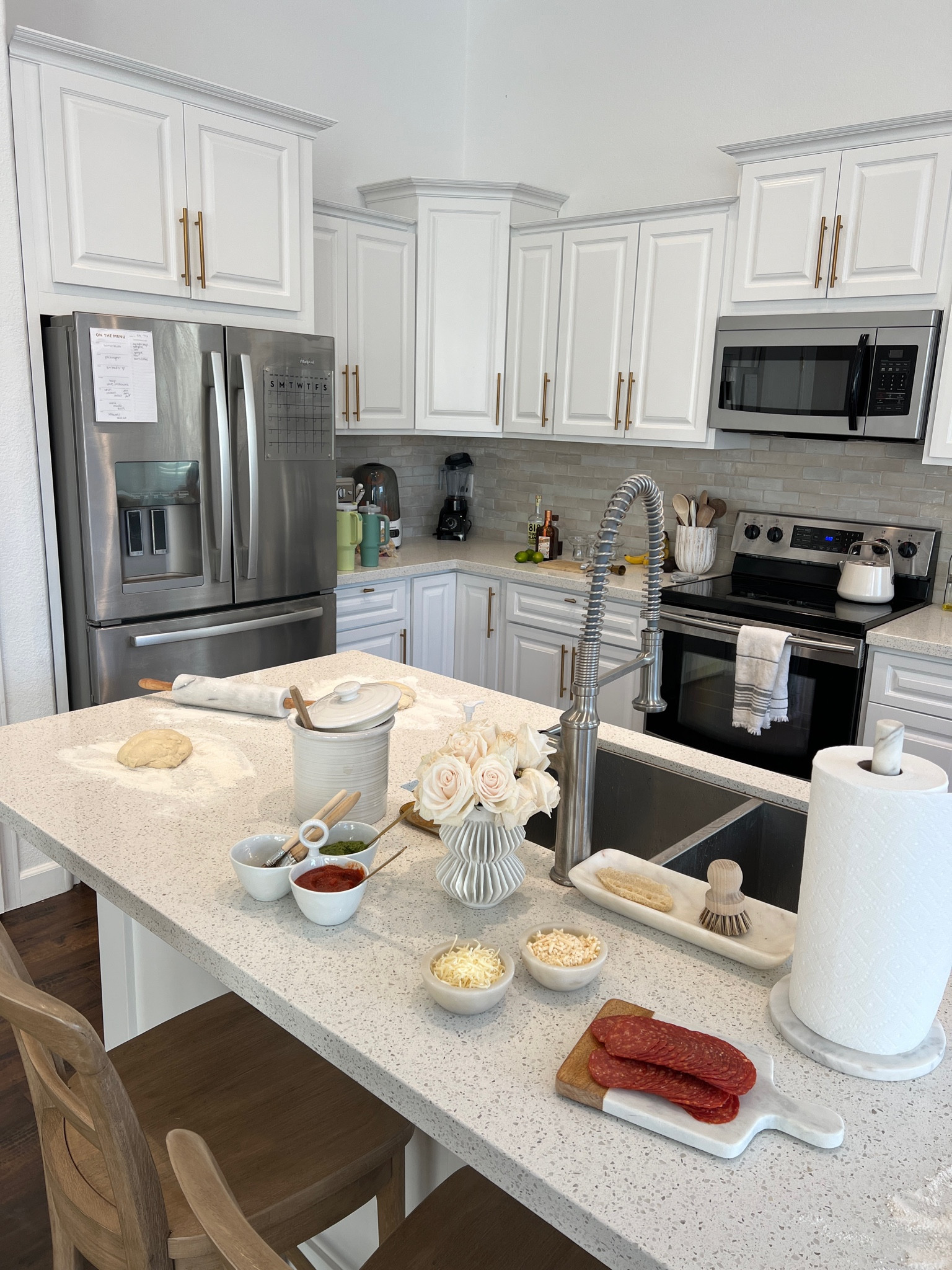 pizza night at home!!! 🍕🤍 love our neutral decor 💫 all pizza supplies from TJ’s! 

#LTKhome