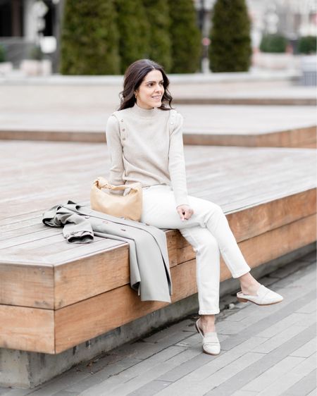 Spring transitional outfit idea: neutral sweater, white jeans, mules, trench coat. #springstyle 

#LTKstyletip