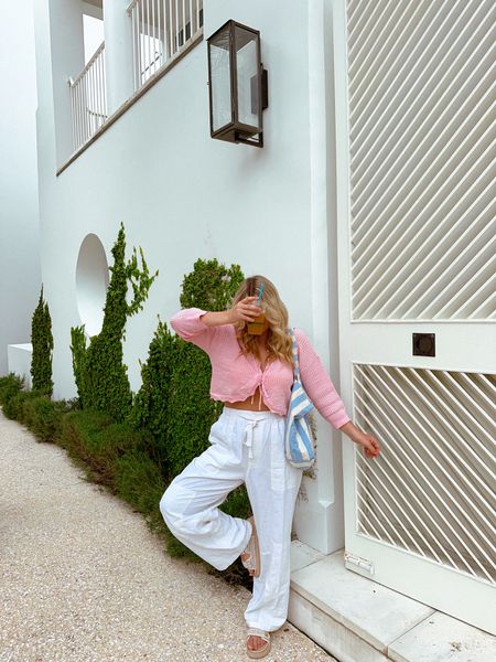 early spring outfit inspo, white linen pants from lulus with cutie knit top from Amazon and paired with sandals from lulus 

#LTKstyletip #LTKSeasonal #LTKfindsunder100