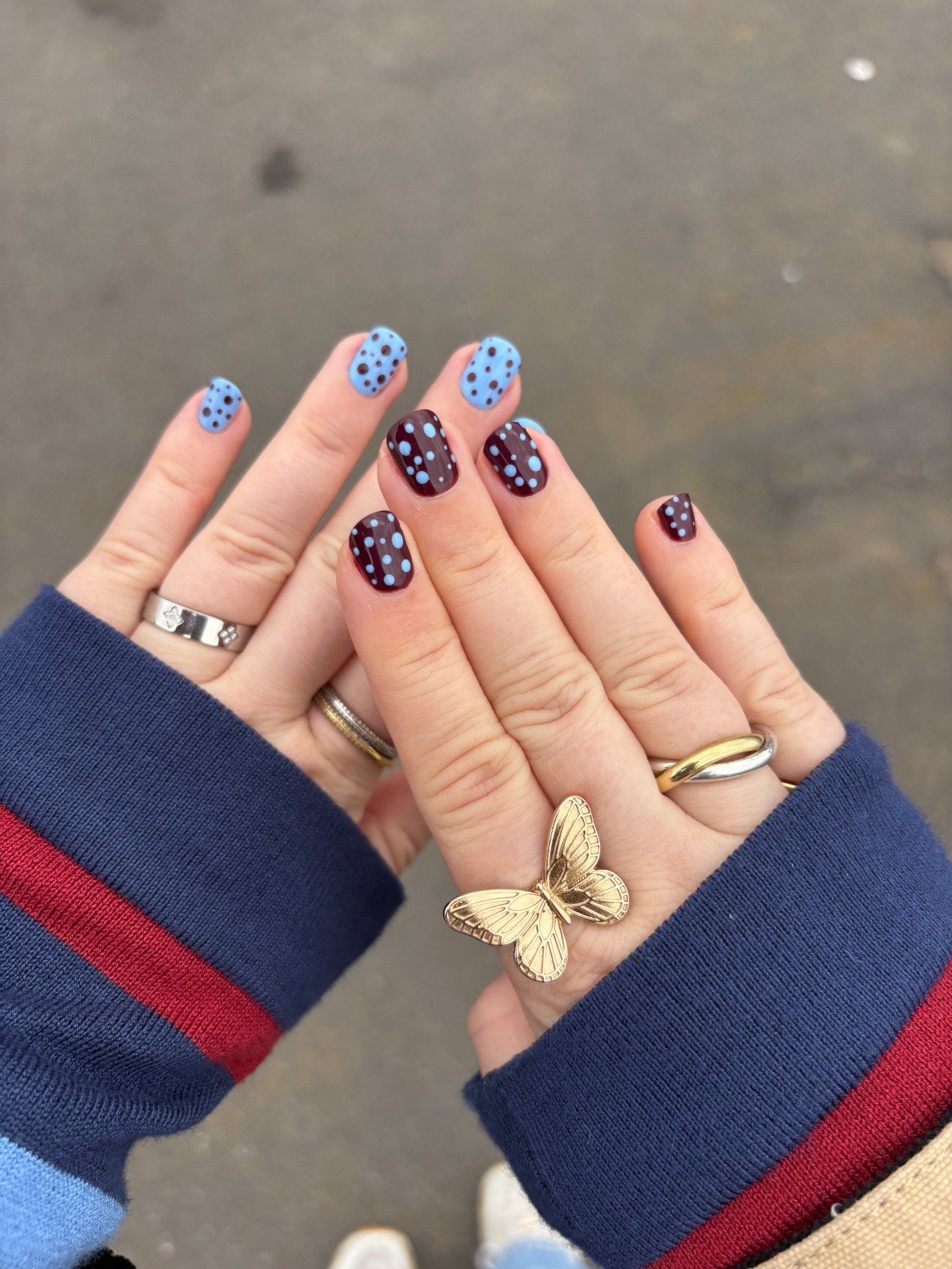 Polka dot nails and mixed metal rings all day everyday 

#LTKautumn