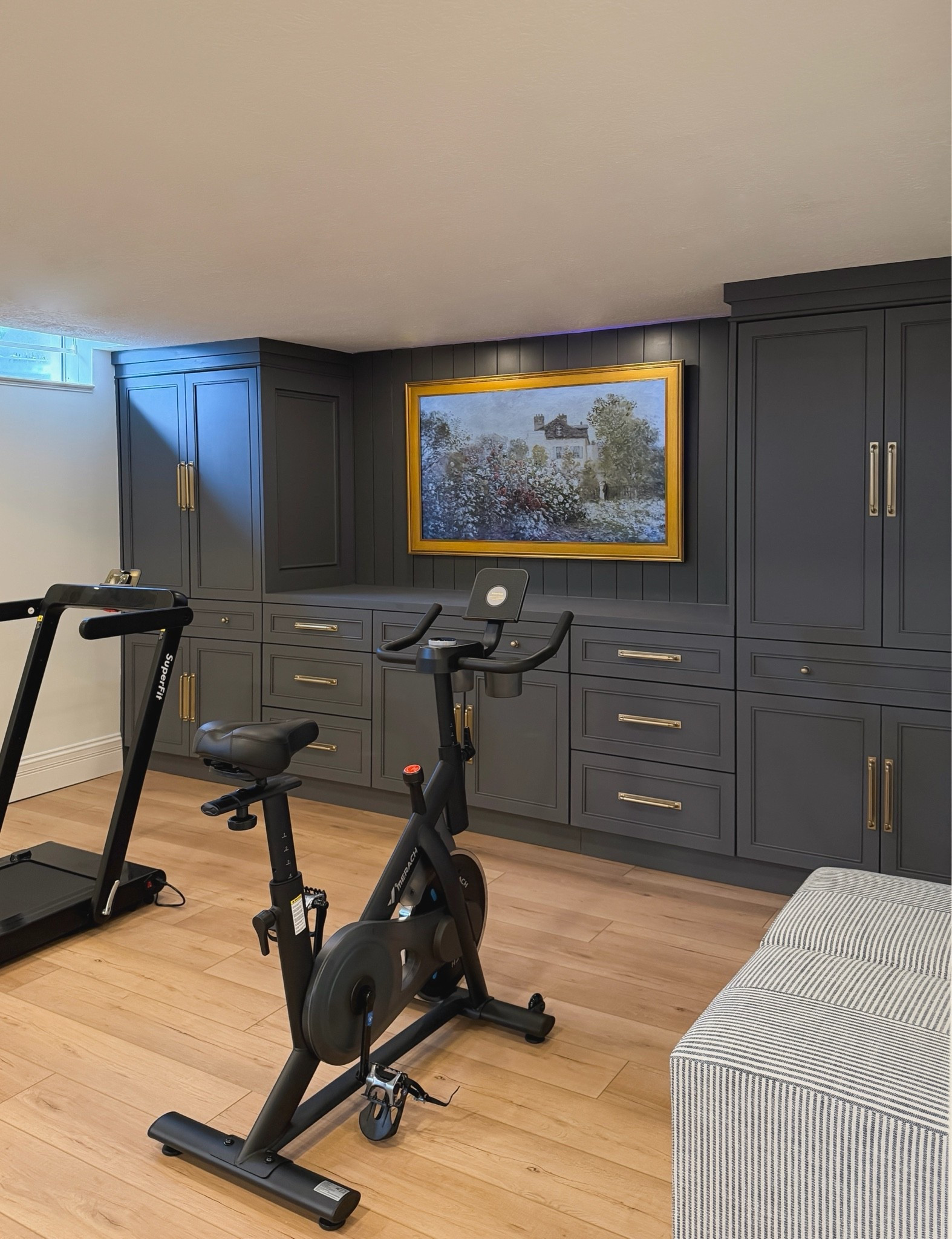 Basement gym sources!  My stationary bike and treadmill are both under $200!