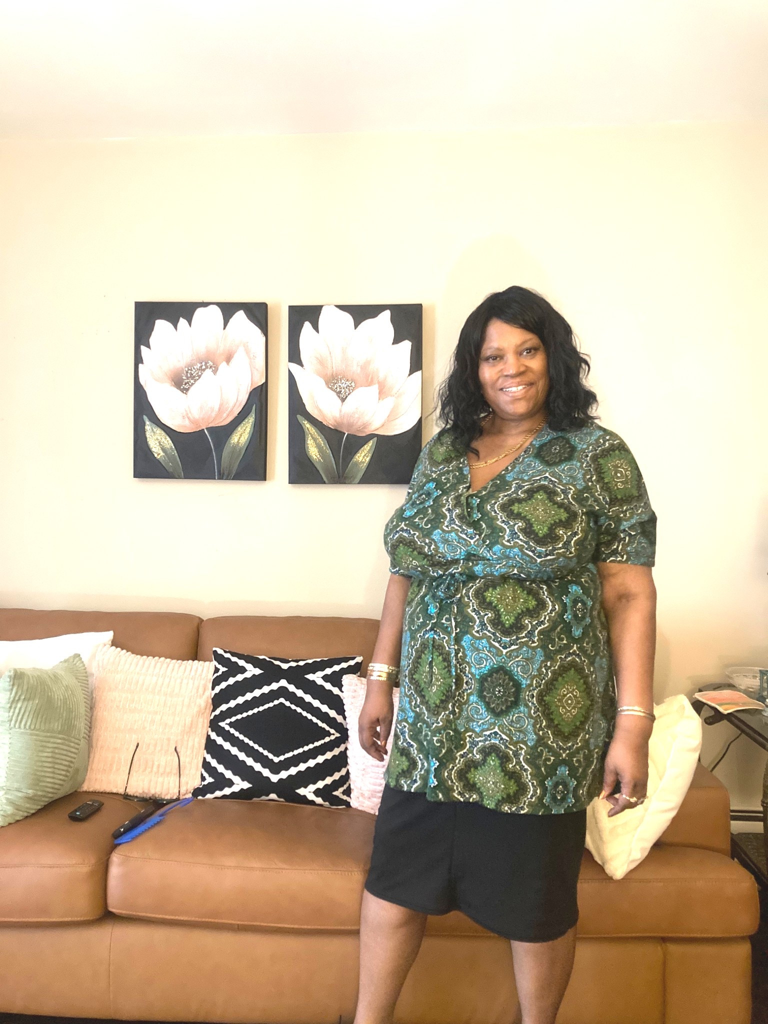 Top that is perfect for spring with a versatile black skirt that can be worn with many different outfits. Wearing puma sneakers in a size  10. But this outfit can be worn with shoes or any sneakers.#Ootdinspo

#LTKOver40 #LTKPlusSize #LTKootd