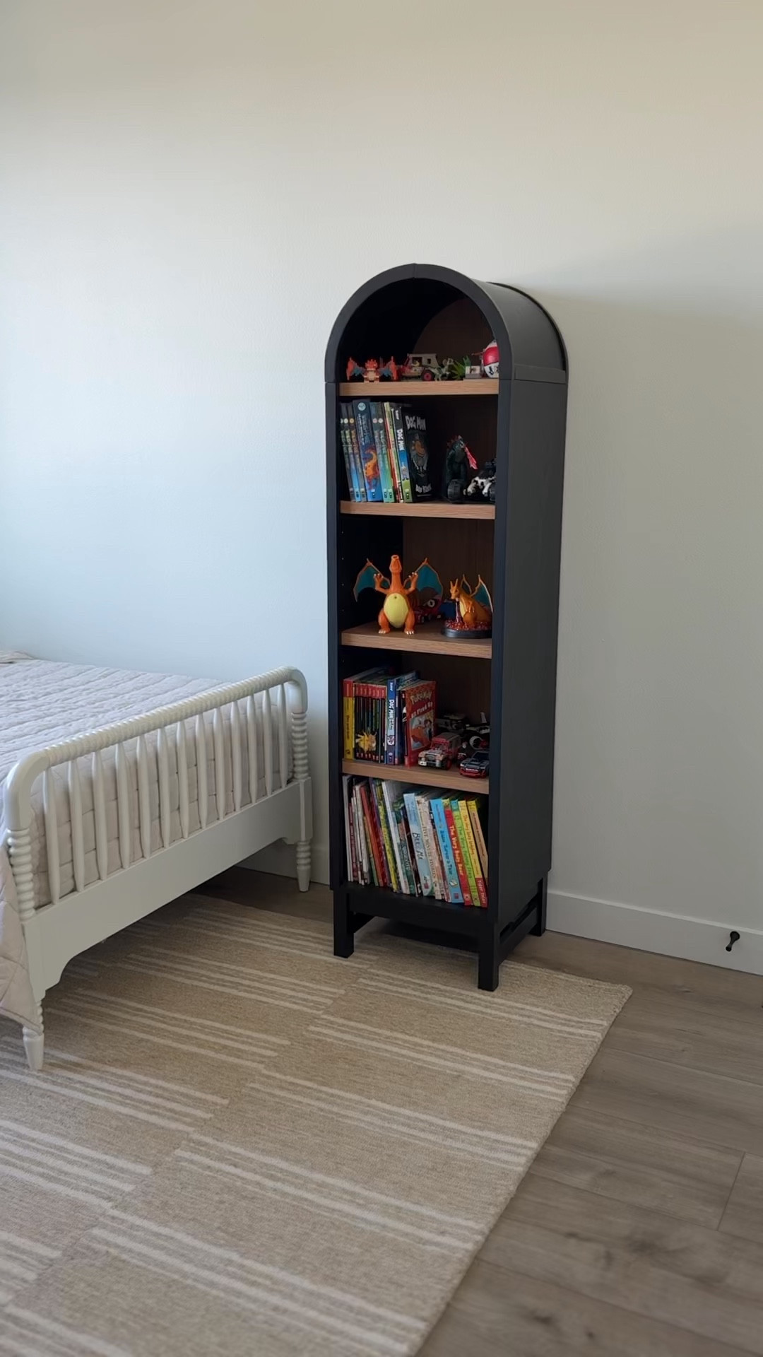 We also have this narrower arch bookshelf that we moved down to my older son’s room. Perfect for books + Legos!

#LTKHome