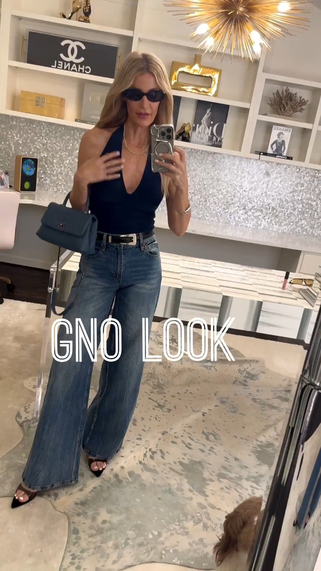 Chic girls’ night out outfit featuring a flattering black halter top and high-waisted wide-leg jeans. The sleek top and modern denim create an effortlessly sexy, polished look. I’m wearing an XS in the top and a size 24 in the jeans. #LTKStyleTip #GirlsNightOut #DenimOutfit 

#LTKOver40#LTKOver40#LTKSaleAlert 

 

#LTKootd