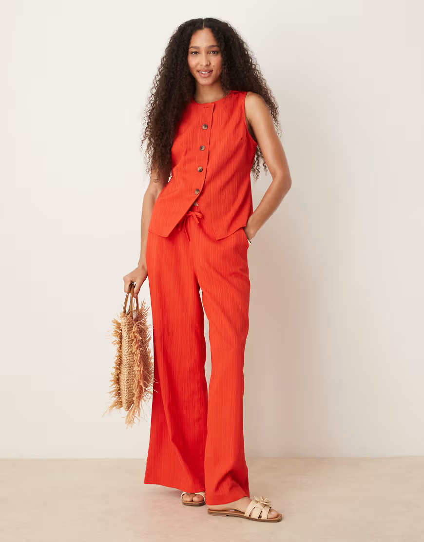 ASOS DESIGN – Palazzo-Hose in Orange mit Knitterstruktur, Kombiteil-Rot | ASOS (Global)