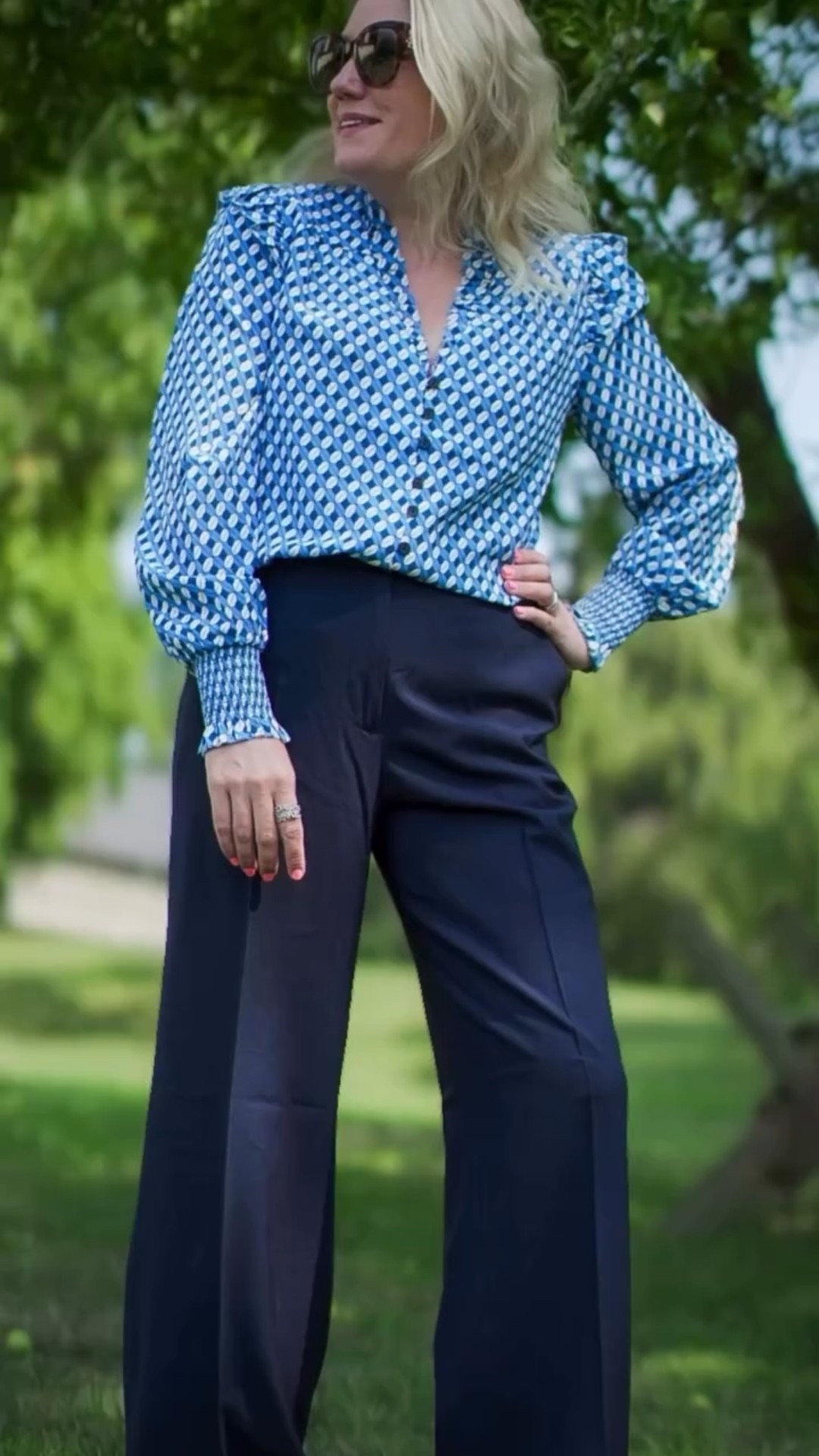 Hey lovelies! 💙✨ Today I’m wearing one of my all-time favourite brands, @cefinnstudio — their elegance, bold colours, and artistic prints always inspire me. This Stella Silk Shirt in Blue Cream Lips Print is such a showstopper: the sculptural shoulders and fluid silk feel so luxe, while that dreamy blue-cream palette with graphic lips print is just a breath of fresh air—playful and refined all at once. Paired with their tailored trousers (also in this lively print), it’s a perfect blend of statement dressing and everyday ease.
Cefinn’s collections never disappoint—whether it’s their vibrant prints, clean silhouettes, or quality fabrics, each piece feels effortlessly chic and modern. If you’re looking to elevate your wardrobe with timeless yet bold styles, you’ve got to explore them.
Outfit deets: Top: Stella Silk Shirt – Blue Cream Lips Print by Cefinn Trousers: by Cefinn
Hope you’re all having a stylish week—tell me what print you’ve been loving lately!

#Cefinn #SilkShirt #PrintAddict #FashionInspo #OOTD #StyleDiaries #StatementPrint #LuxurySilk #EverydayElegance #LipsPrint #WinterFashion #ElevatedBasics #EffortlessChic #WardrobeEssentials