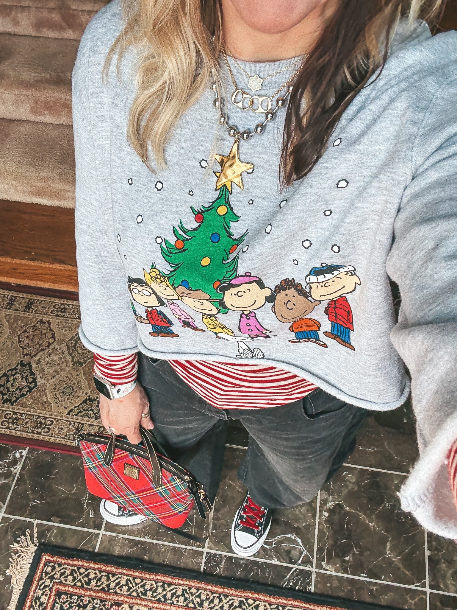Charlie Brown sweatshirt is a few years old and I cut it. Love it layered with this striped long sleeve tee. These black jeans are so good too! I wear my true size in them. 
⭐️My necklace will be available soon. 


#LTKHoliday #LTKootd #LTKOver40