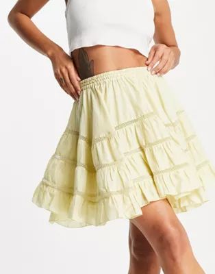 ASOS DESIGN mini skirt with lace trim insert in washed yellow | ASOS (Global)